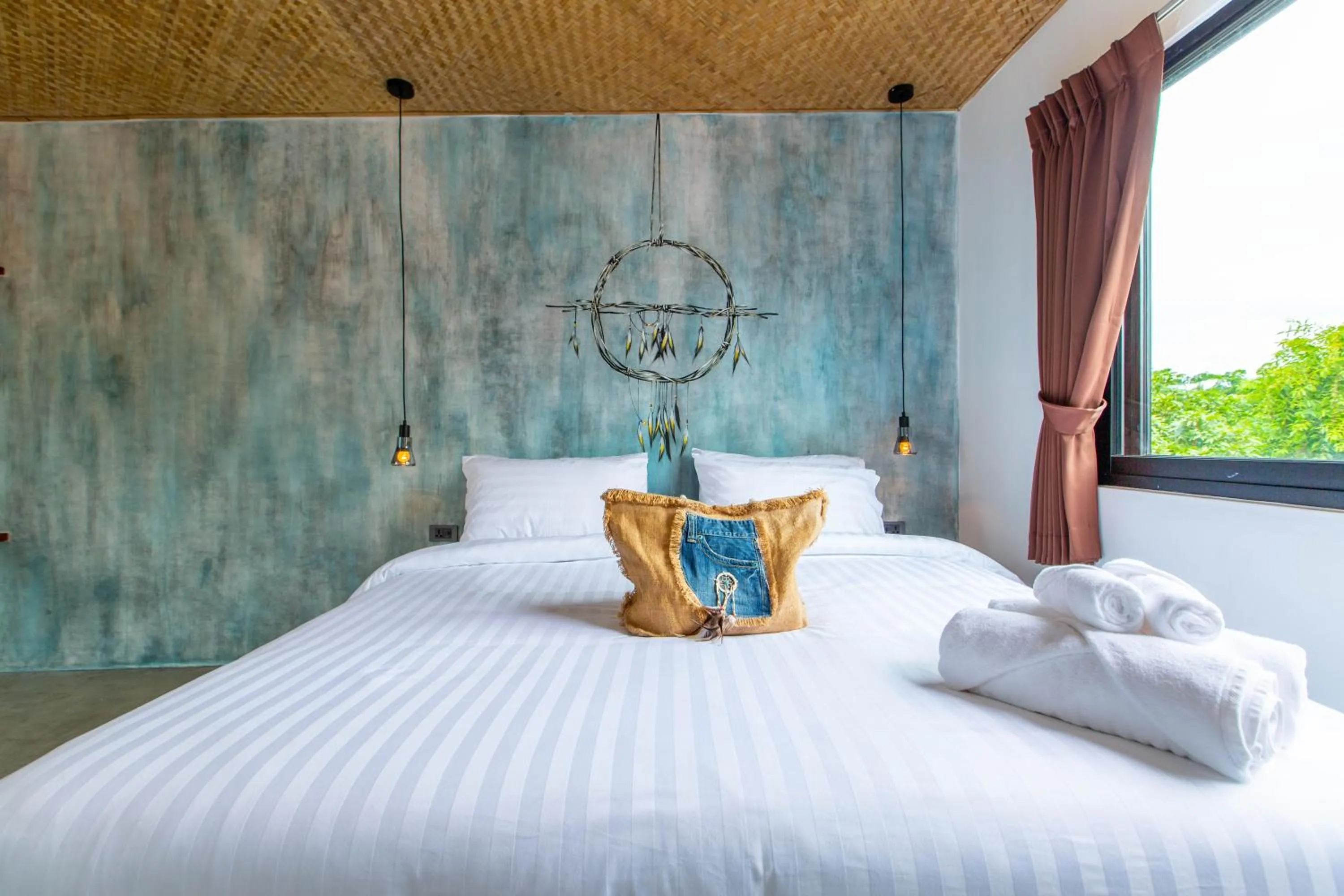 Bed in Dreamcatcher Boutique Hotel