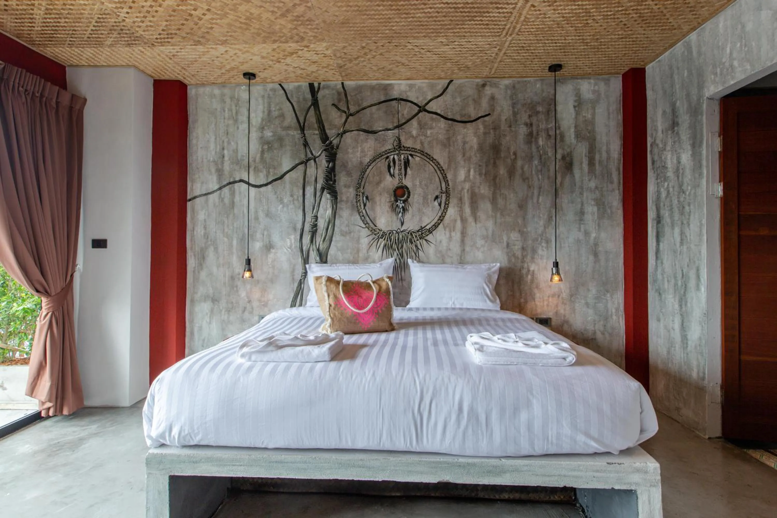 Bed in Dreamcatcher Boutique Hotel