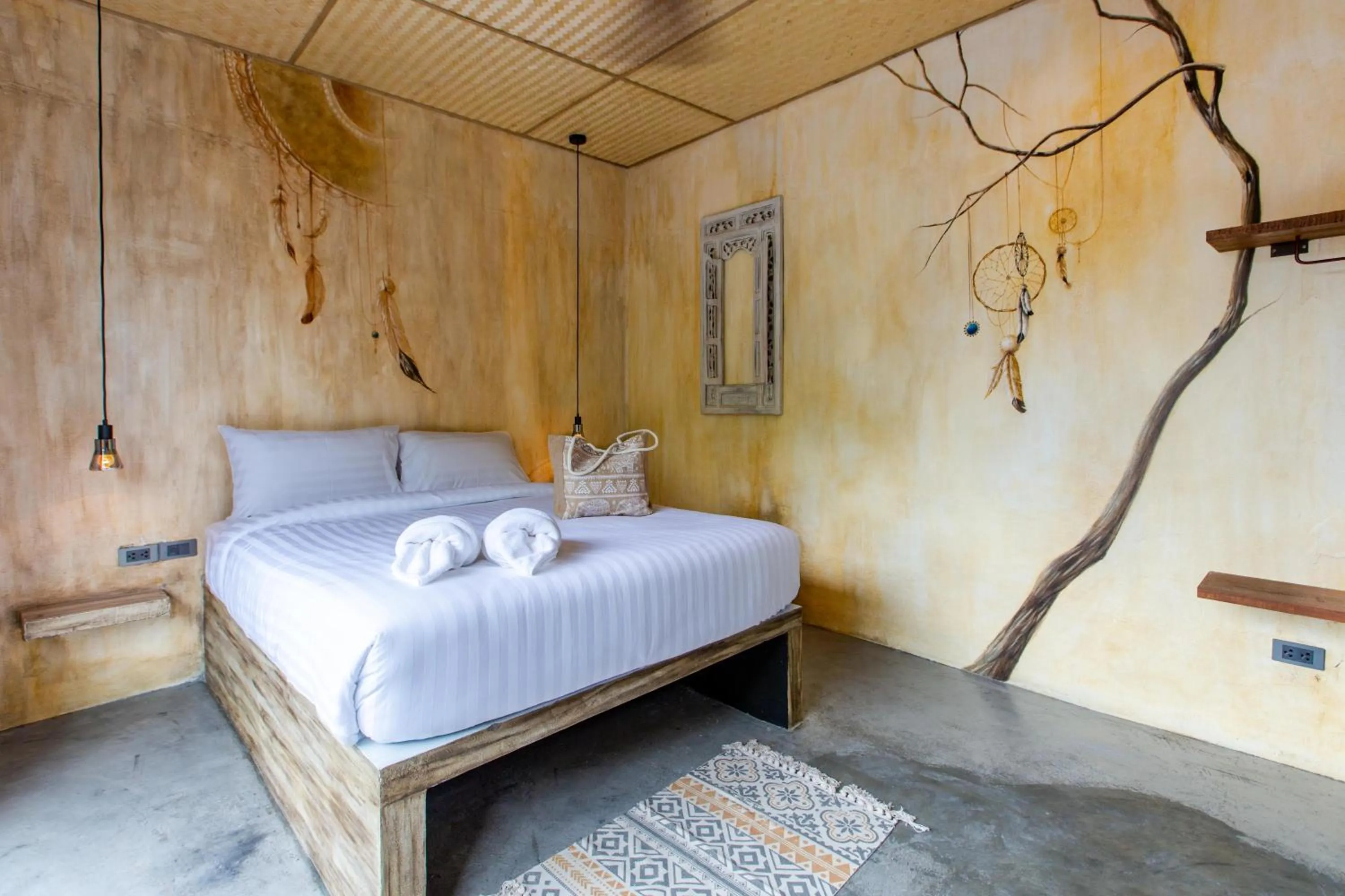 Bed in Dreamcatcher Boutique Hotel