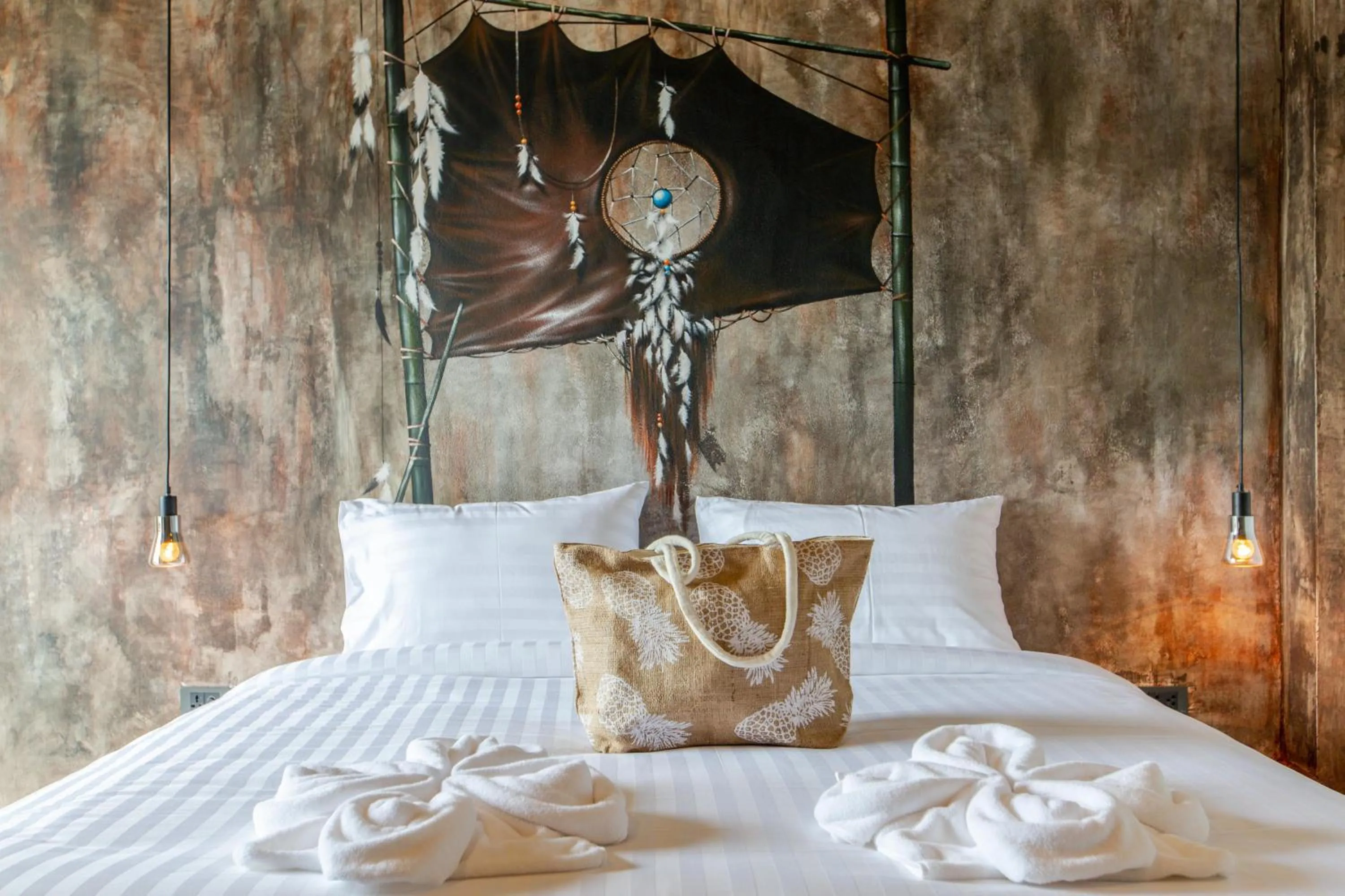 Bed in Dreamcatcher Boutique Hotel