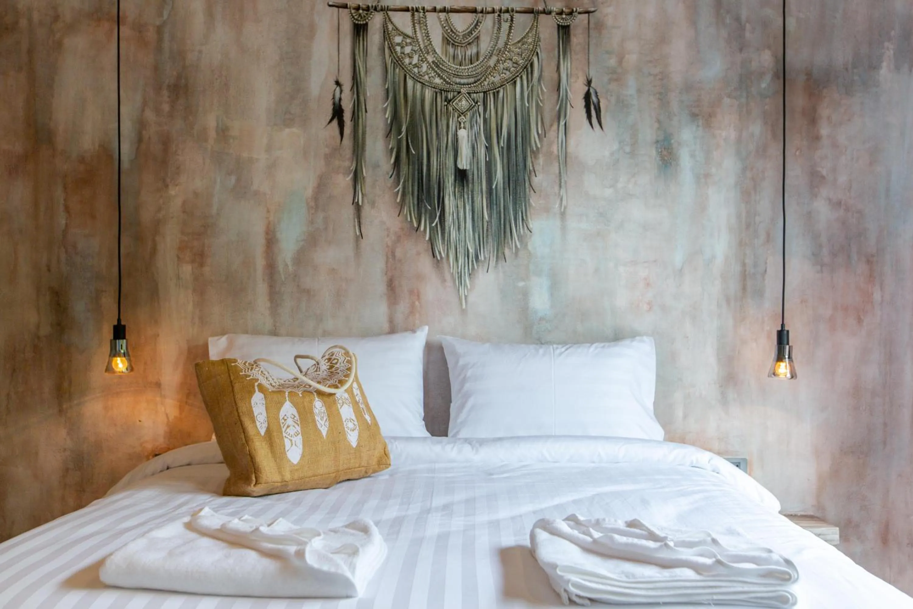Bed in Dreamcatcher Boutique Hotel