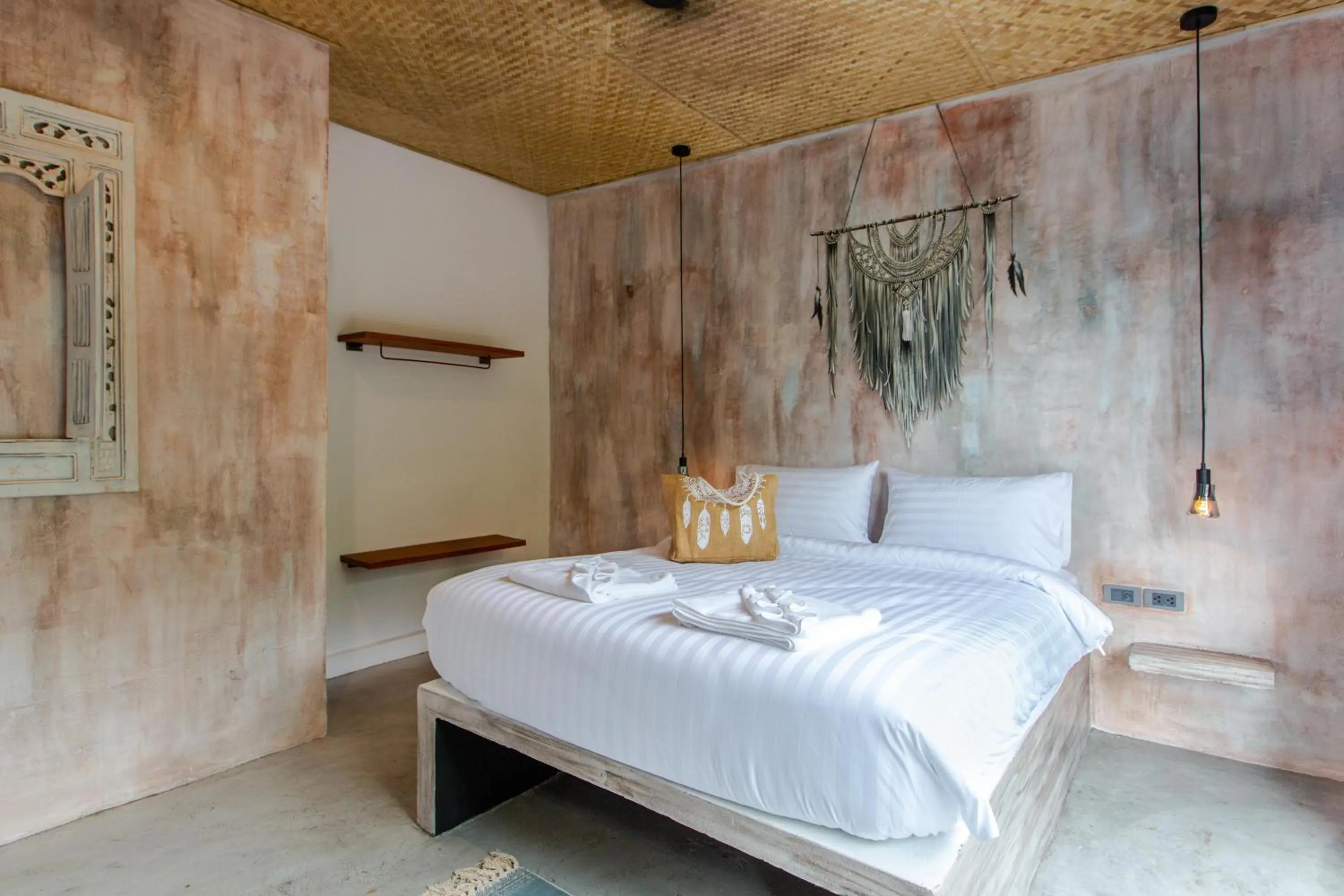 Bed in Dreamcatcher Boutique Hotel