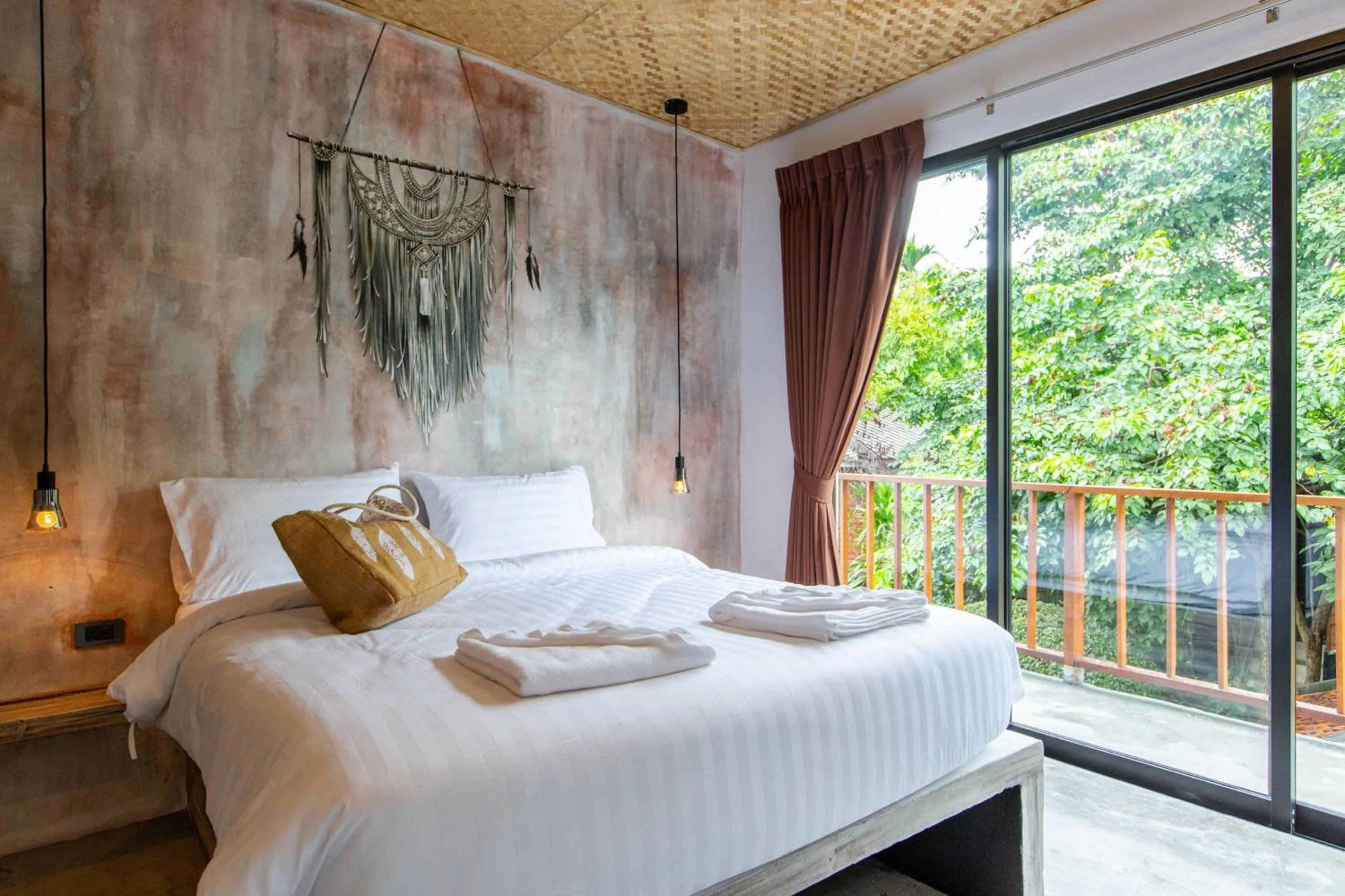 Bed in Dreamcatcher Boutique Hotel