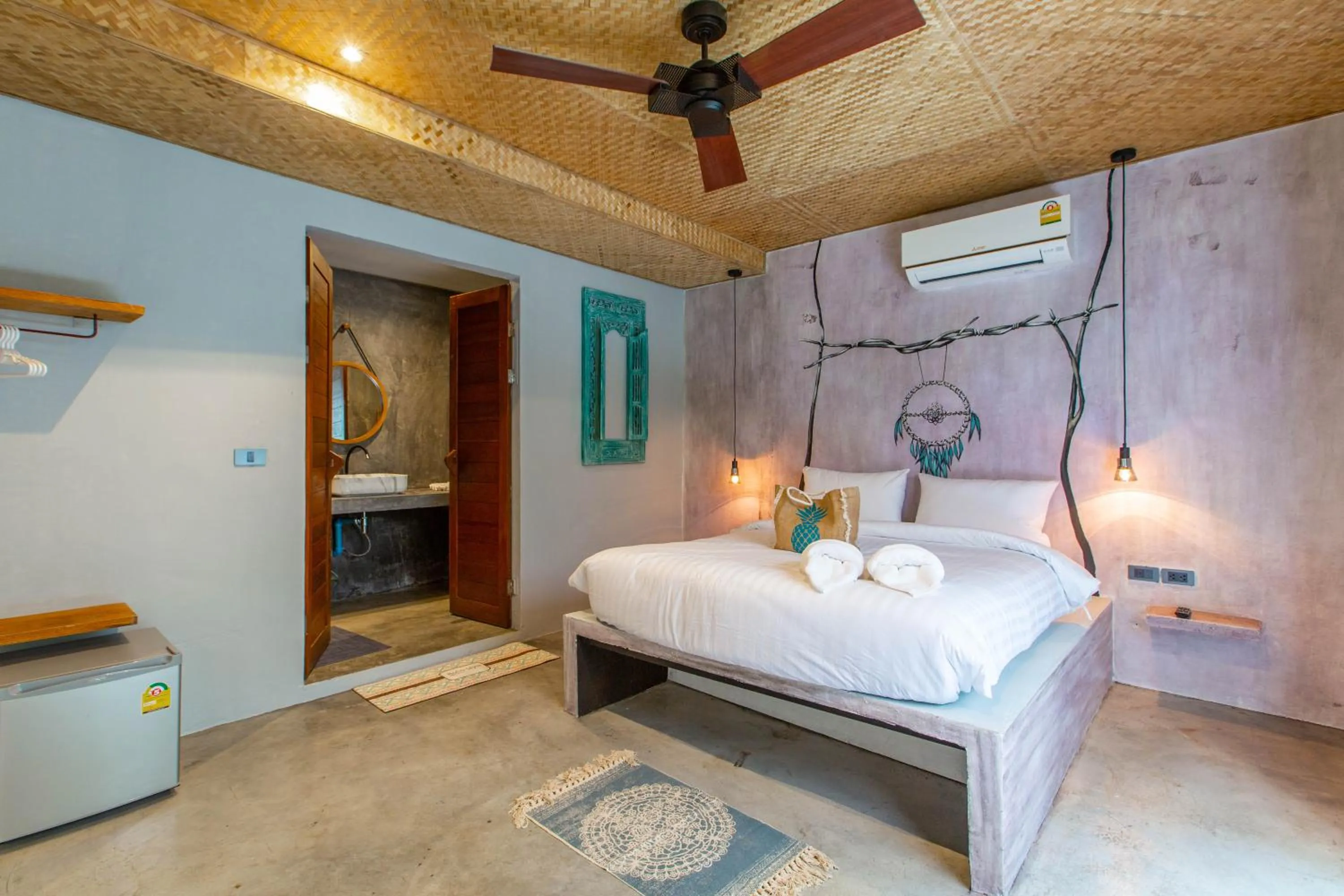 Bed in Dreamcatcher Boutique Hotel