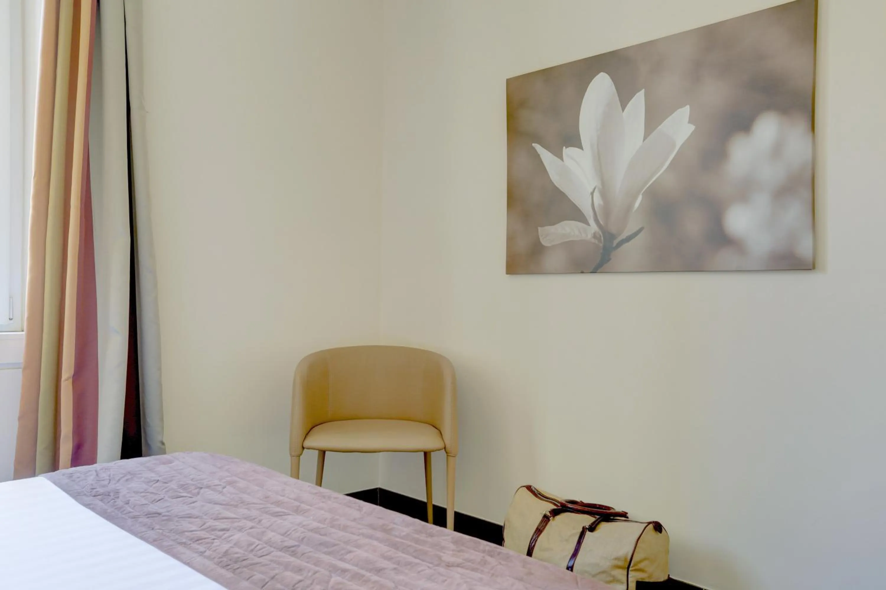 Bed in Colosseo Gardens - My Extra Home