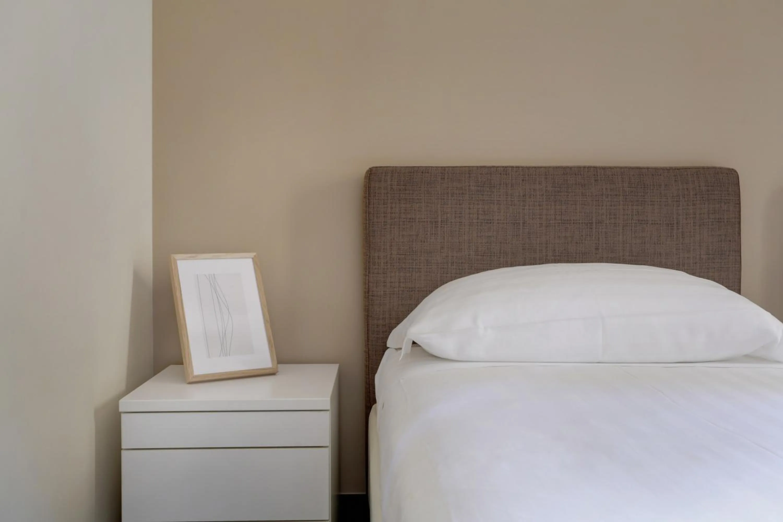 Bed in Colosseo Gardens - My Extra Home