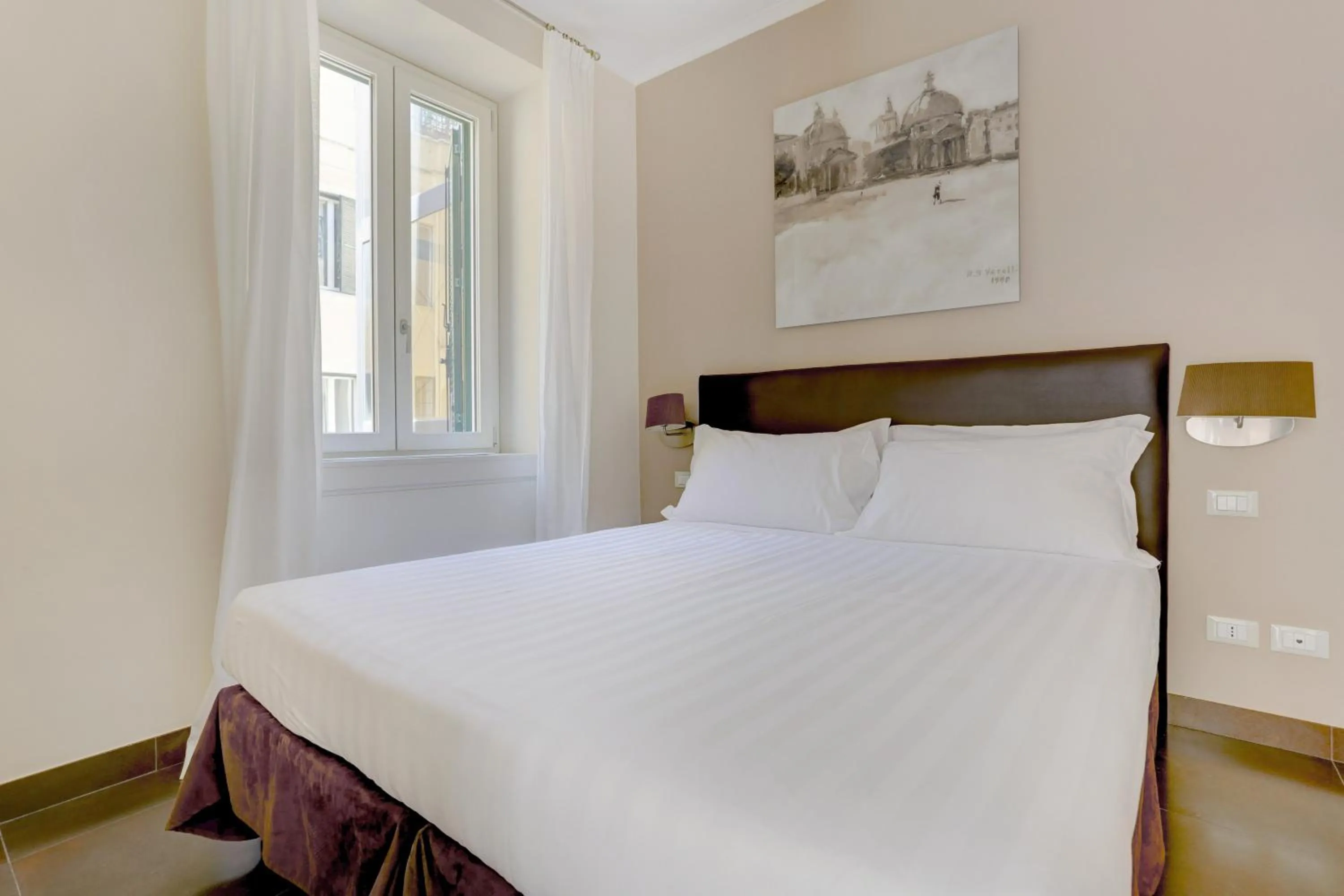 Bed in Colosseo Gardens - My Extra Home