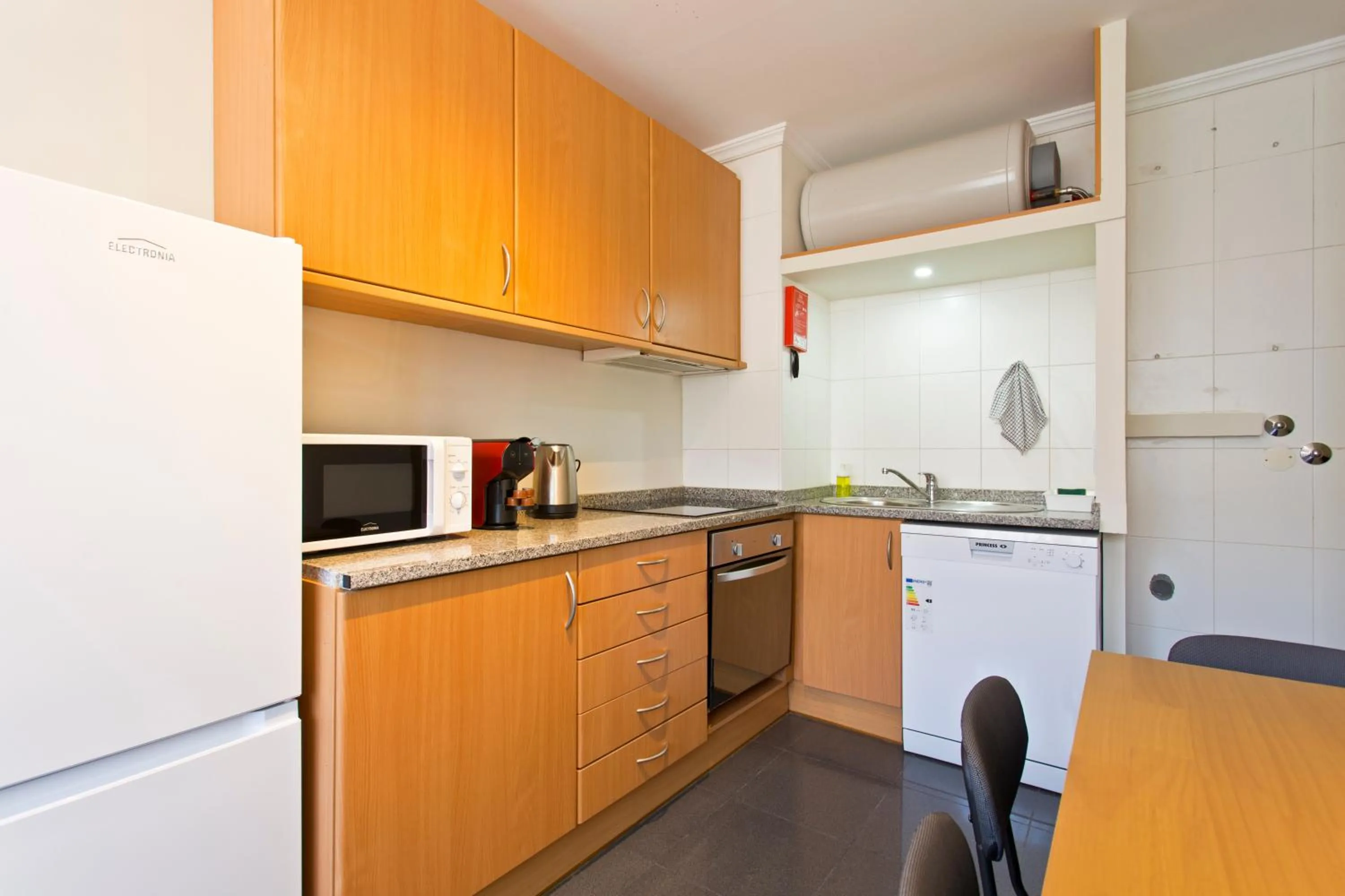 Kitchen or kitchenette in Studios Porto Solar