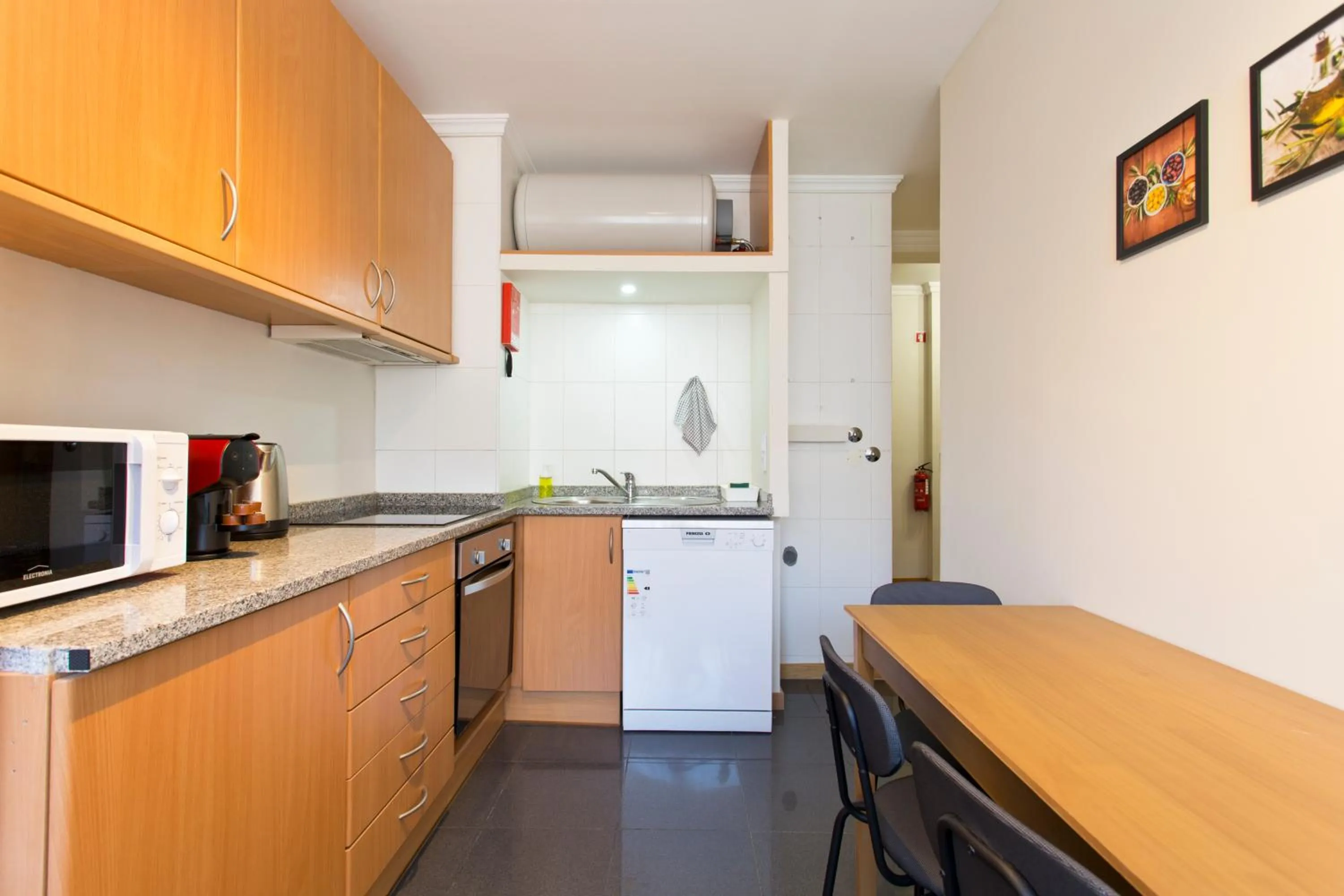 Kitchen or kitchenette in Studios Porto Solar