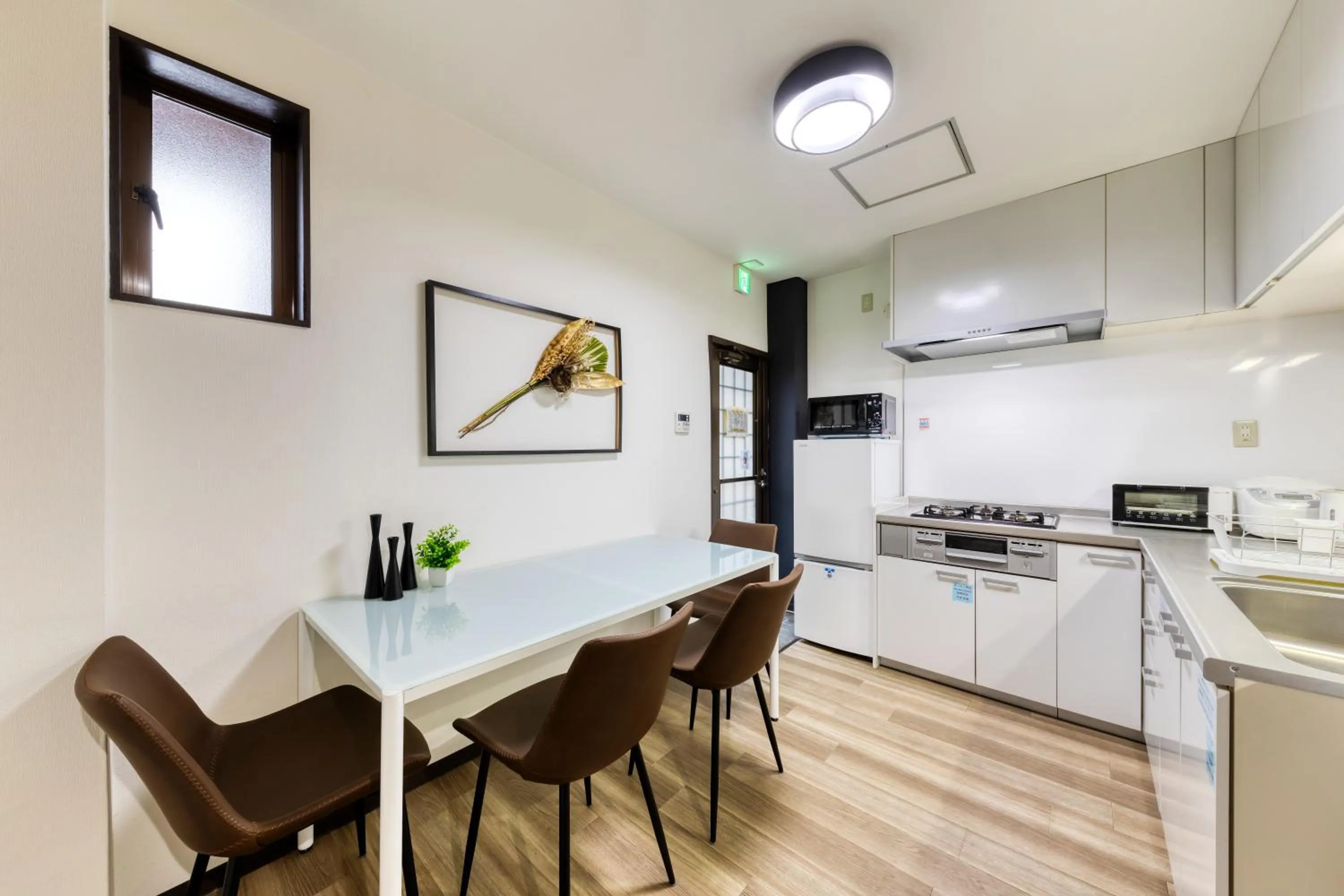 Kitchen or kitchenette in soleil Universal Fukushima Noda -vacation rental-