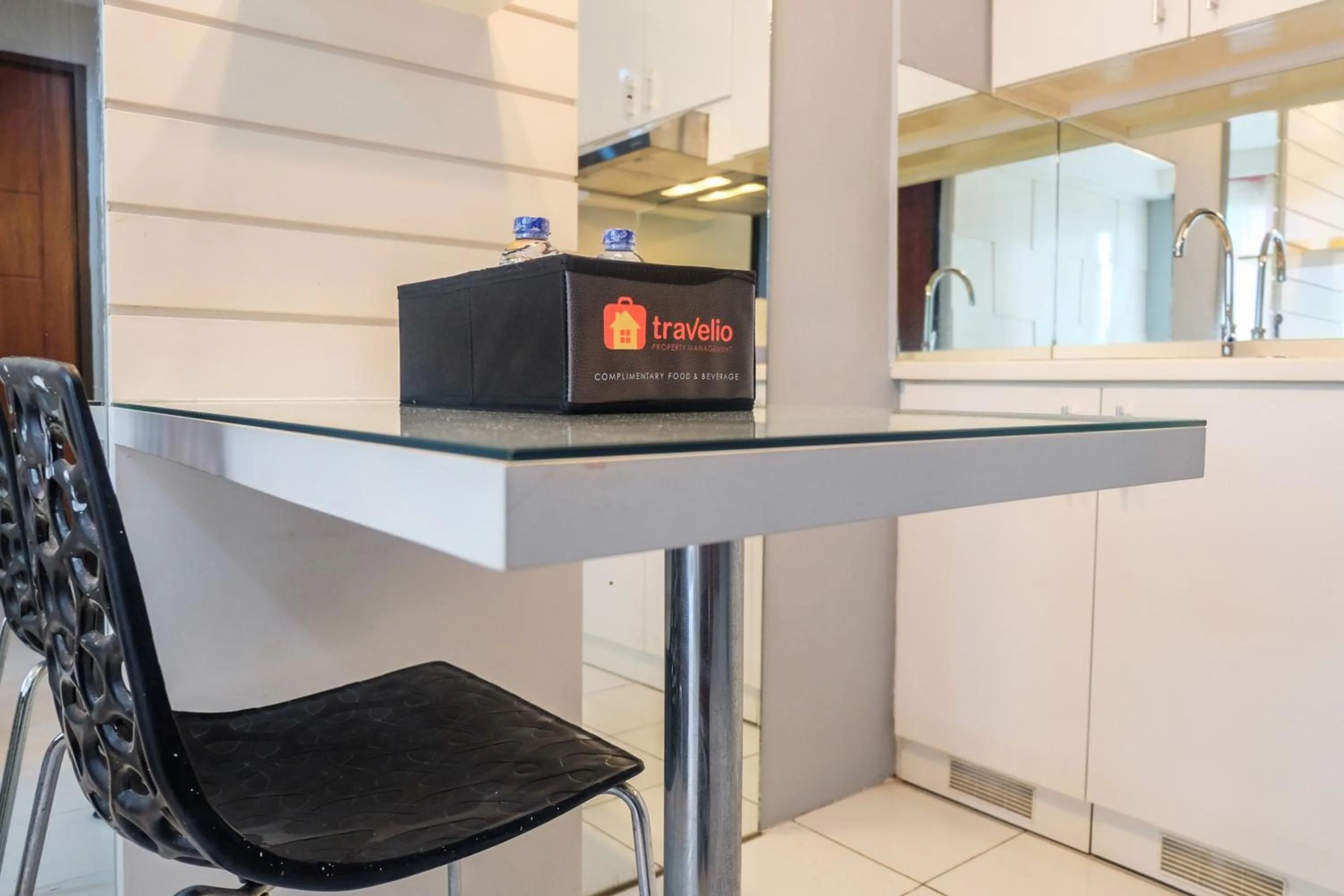 Dining area in Best Price and Minimalist 2BR Kebagusan City Apartment By Travelio