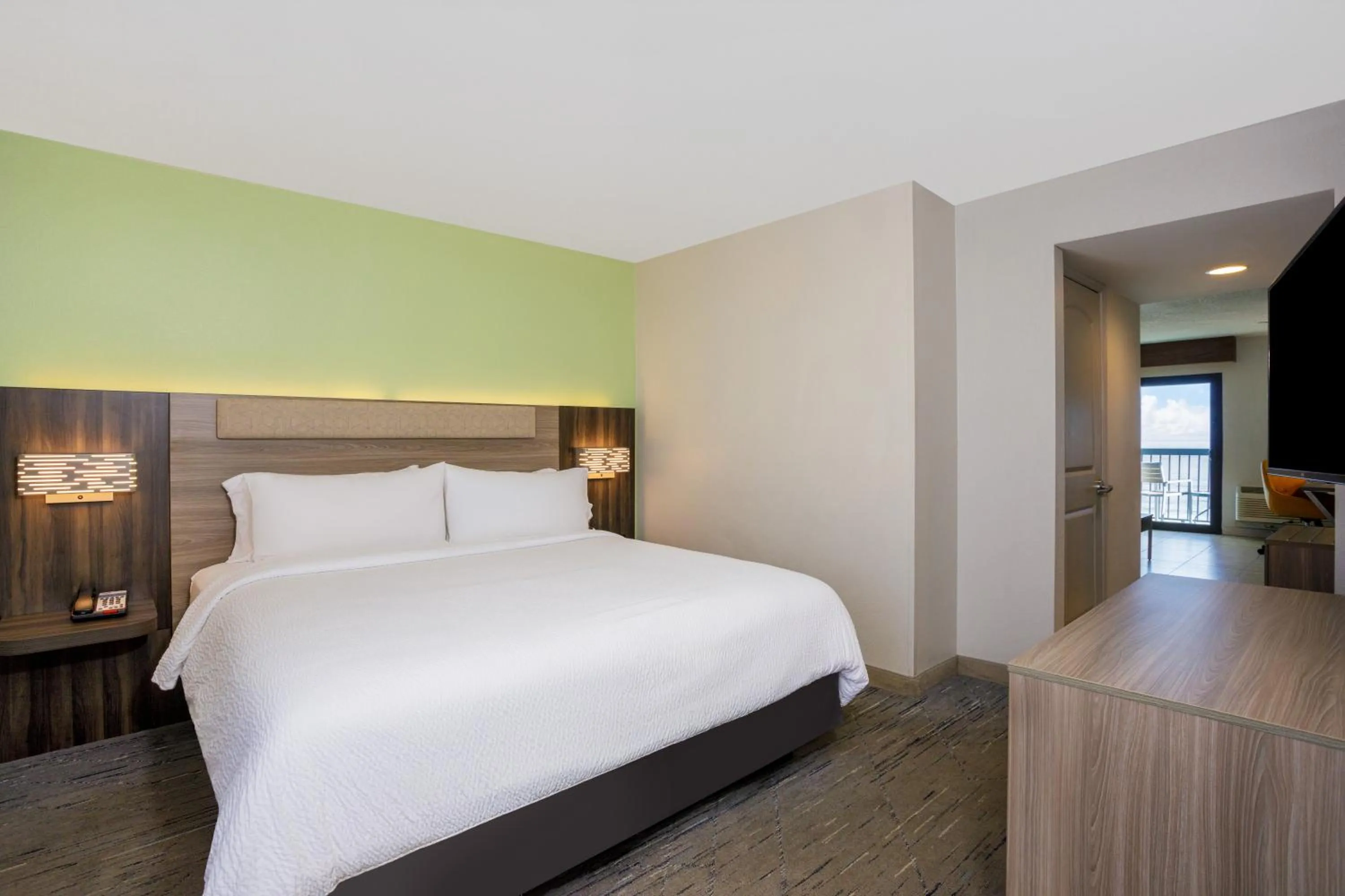 Bedroom, Bed in Holiday Inn Express & Suites Oceanfront Daytona Beach Shores by IHG