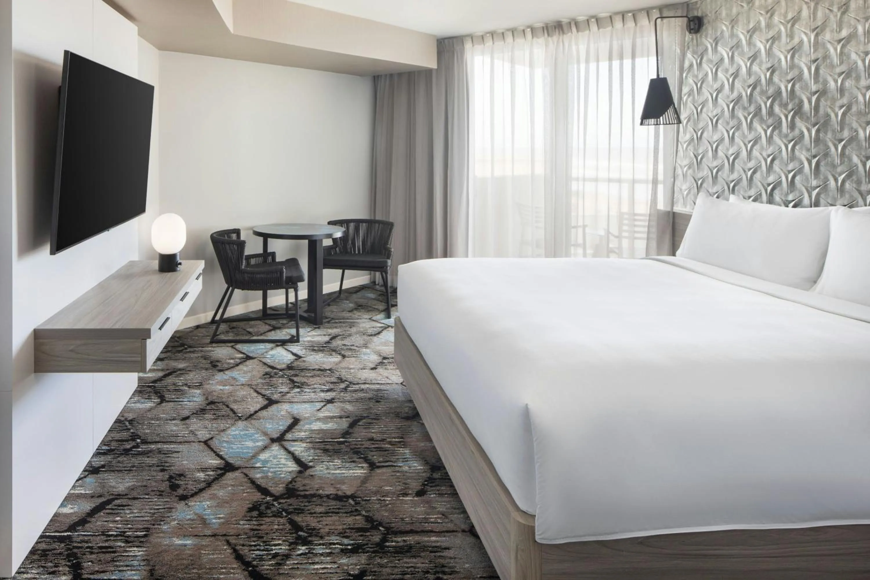 Photo of the whole room, Bed in Renaissance Daytona Beach Oceanfront Hotel