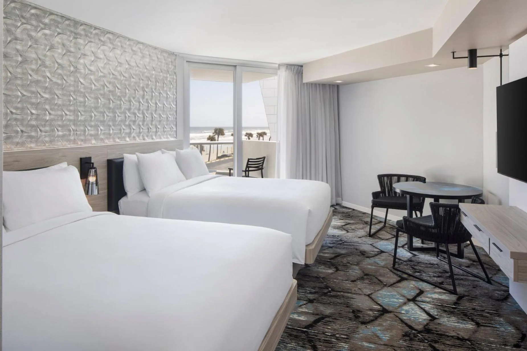 Bed in Renaissance Daytona Beach Oceanfront Hotel