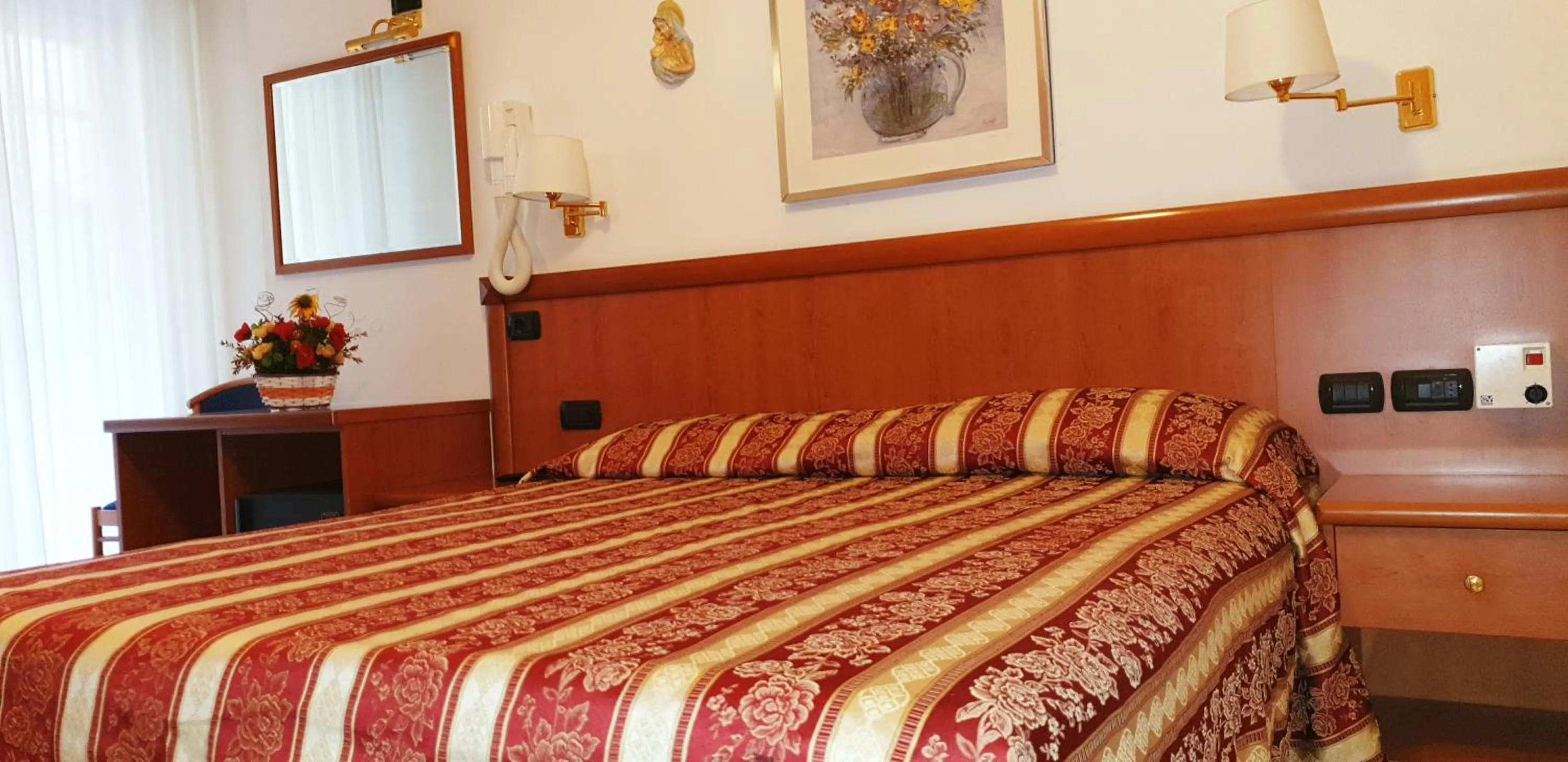 Bed in Hotel Ginevra