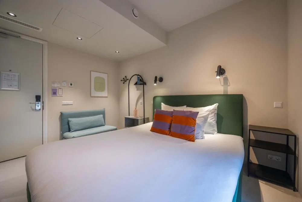 Bed in hotel emma next