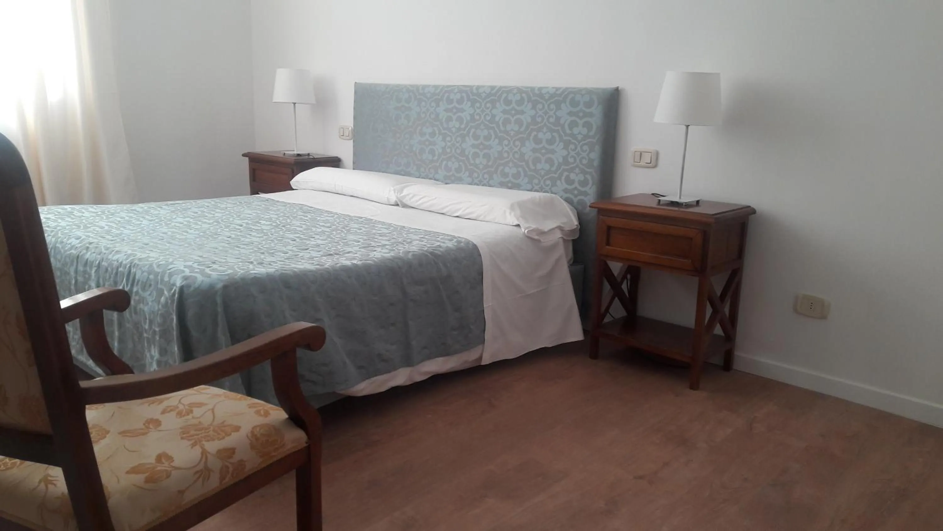 Bed in Il Grifo Camere e Suites