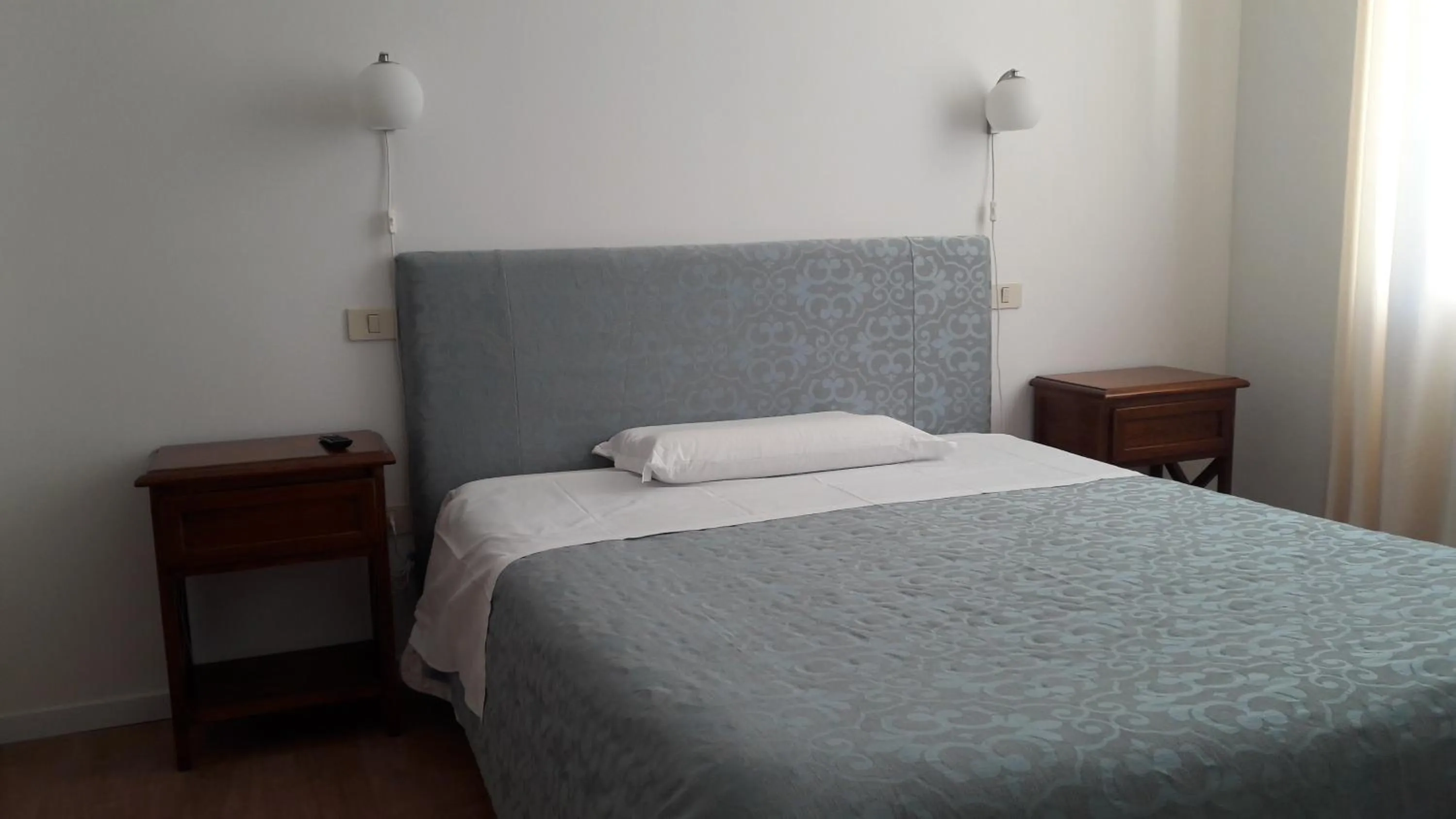 Bed in Il Grifo Camere e Suites