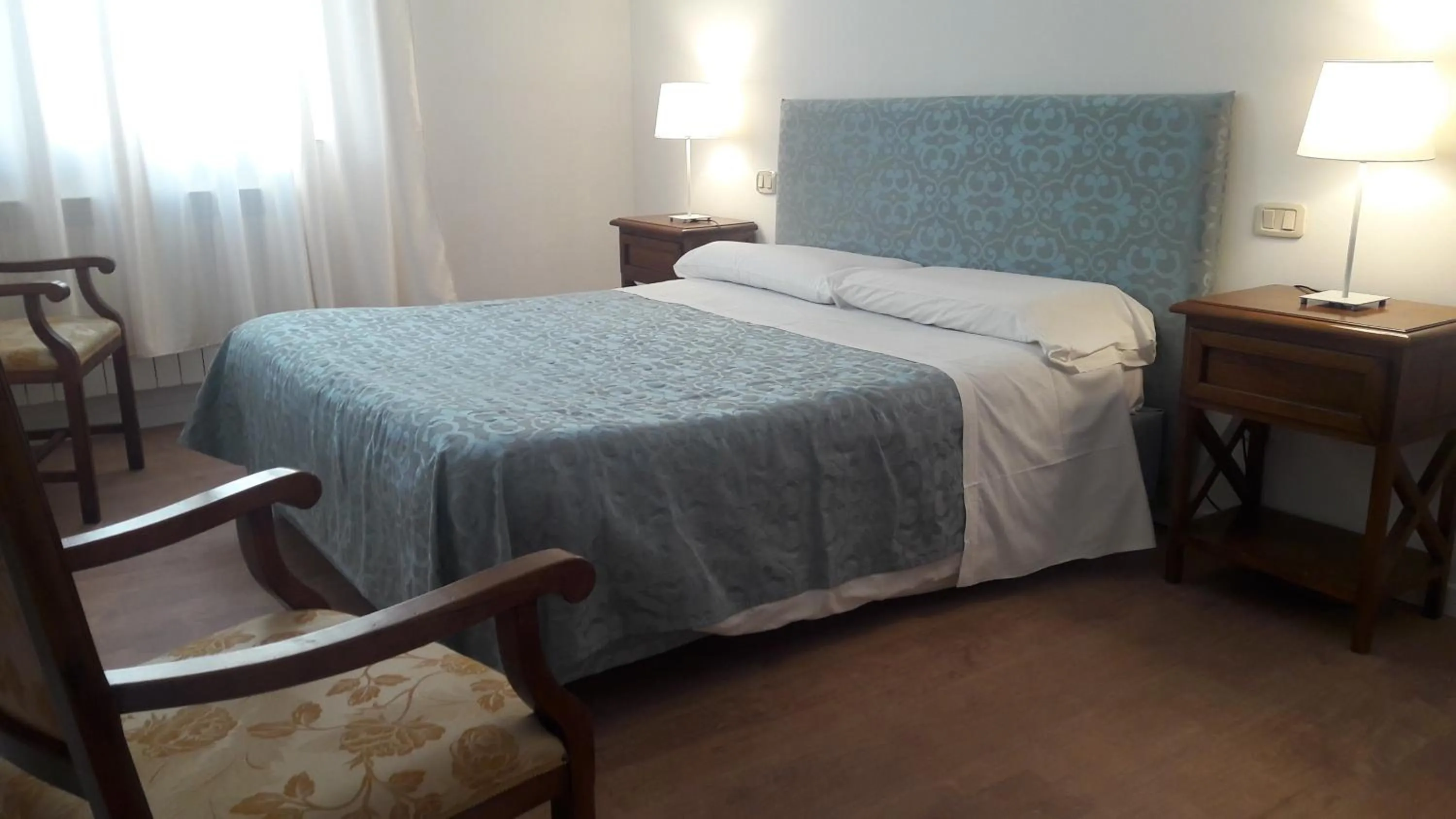 Bed in Il Grifo Camere e Suites