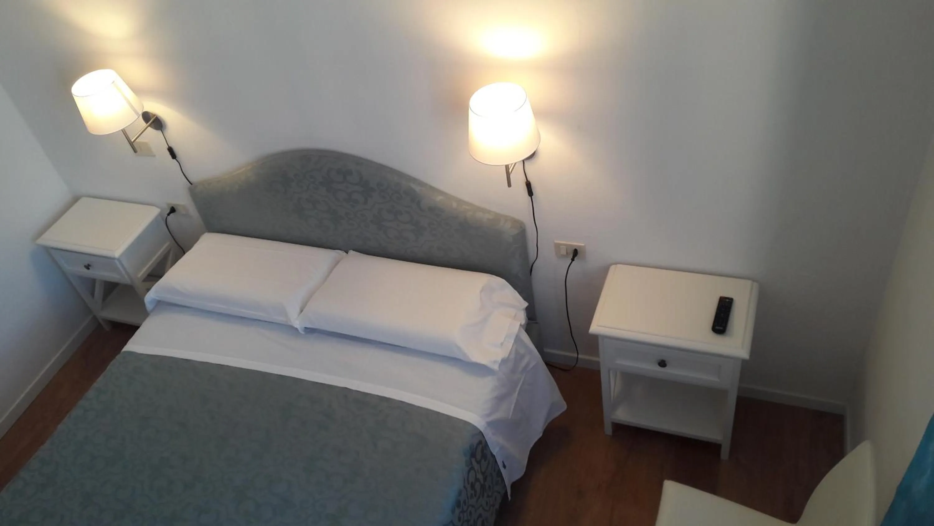 Bed in Il Grifo Camere e Suites