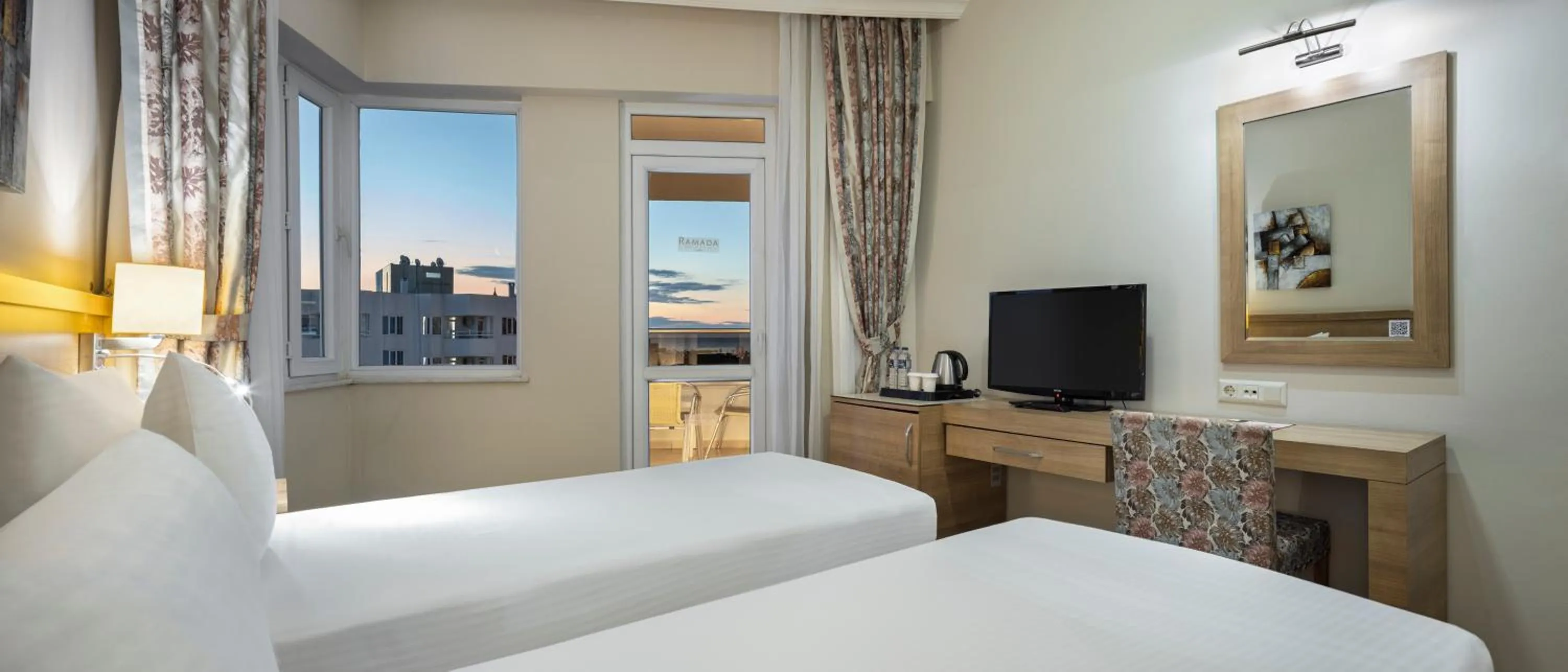 Bed in Ramada Resort By Wyndham Lara