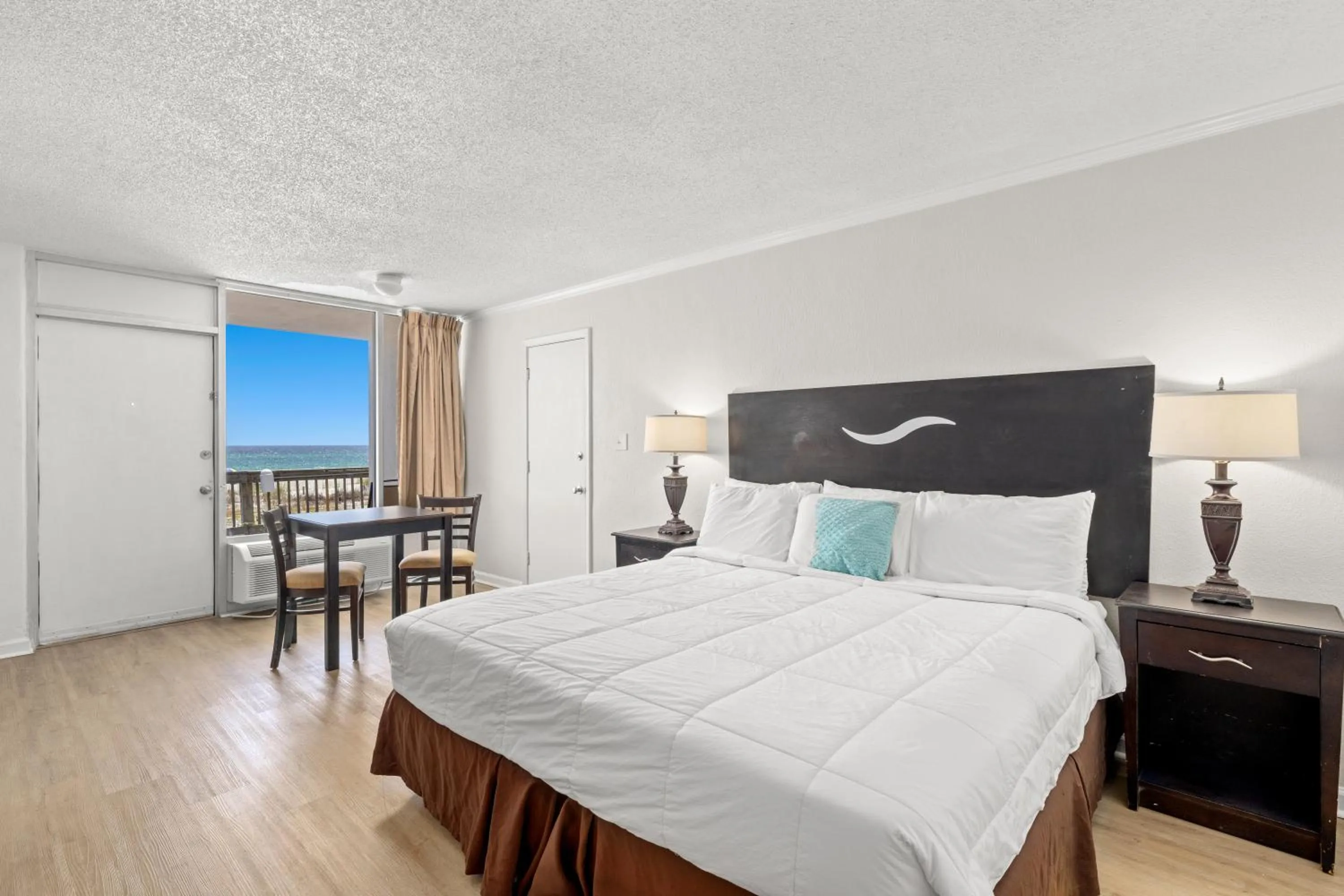 Photo of the whole room, Bed in The Reef At Seahaven Beach Resorts