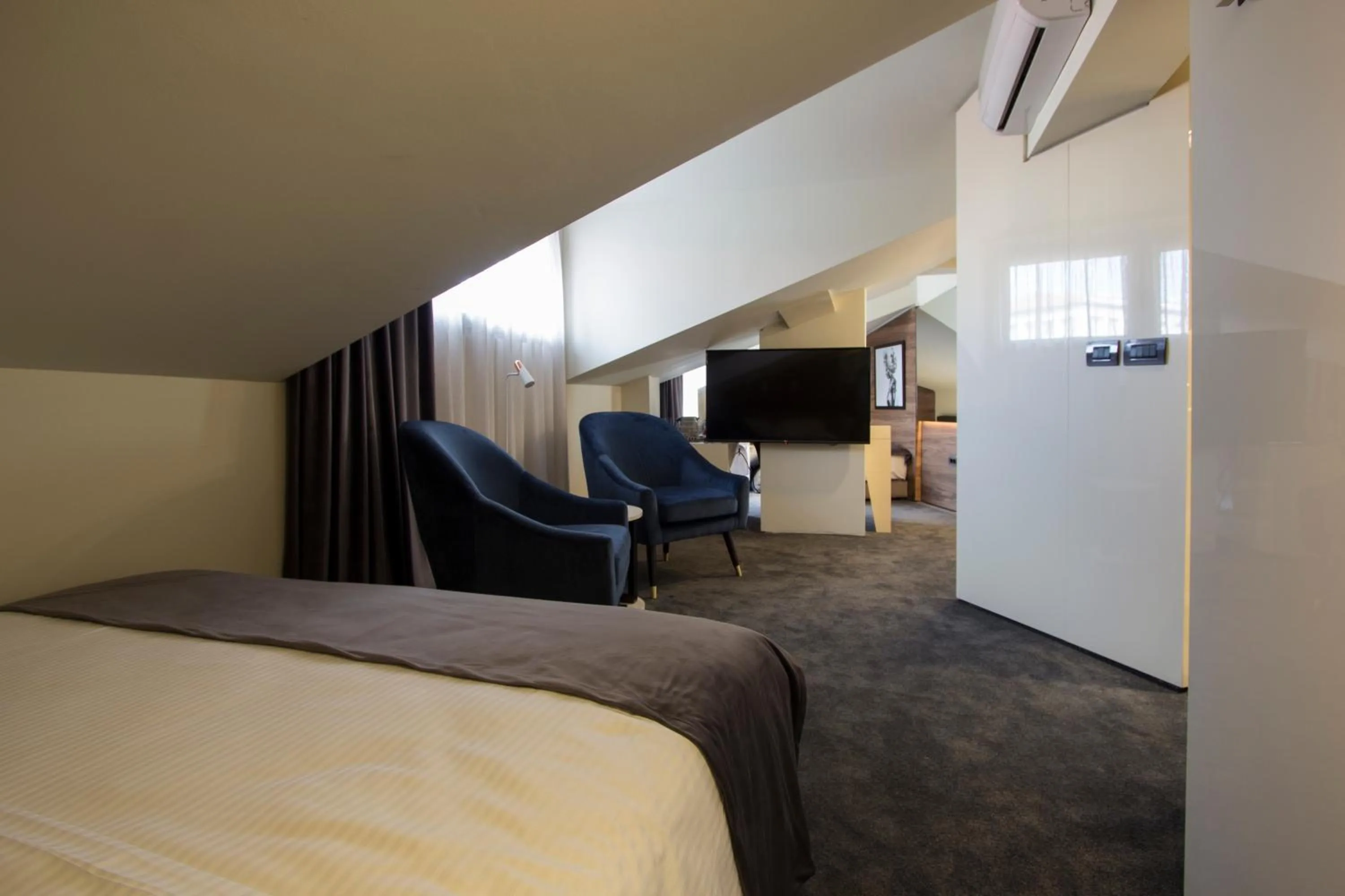 Bed in BOUTIQUE 25h by Eva stay 018