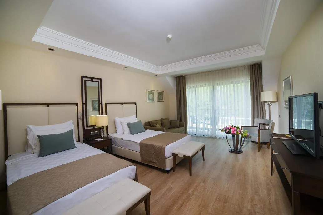 Bedroom in Juju Premier Palace Hotel