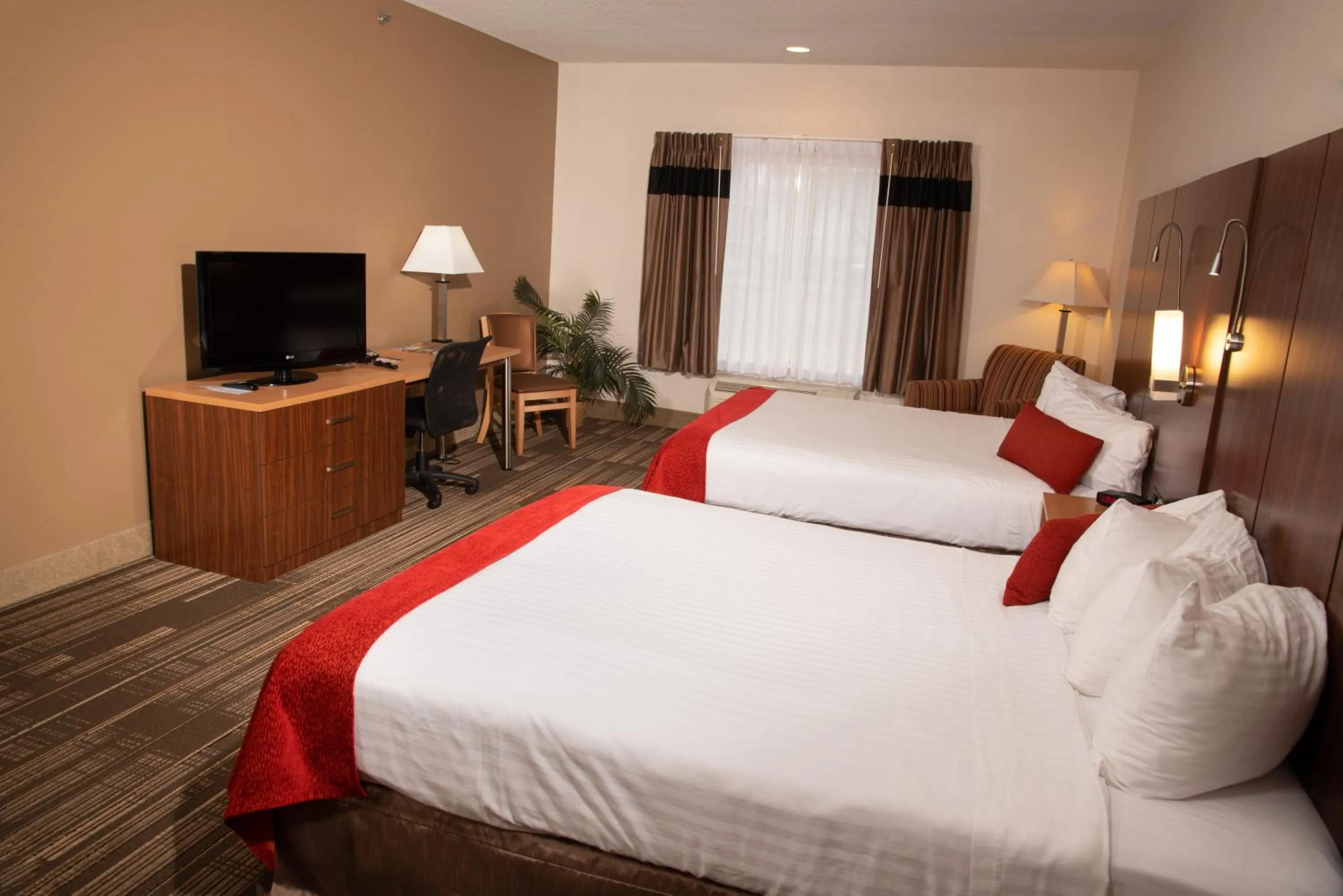 Bed in Northfield Inn Suites and Conference Center