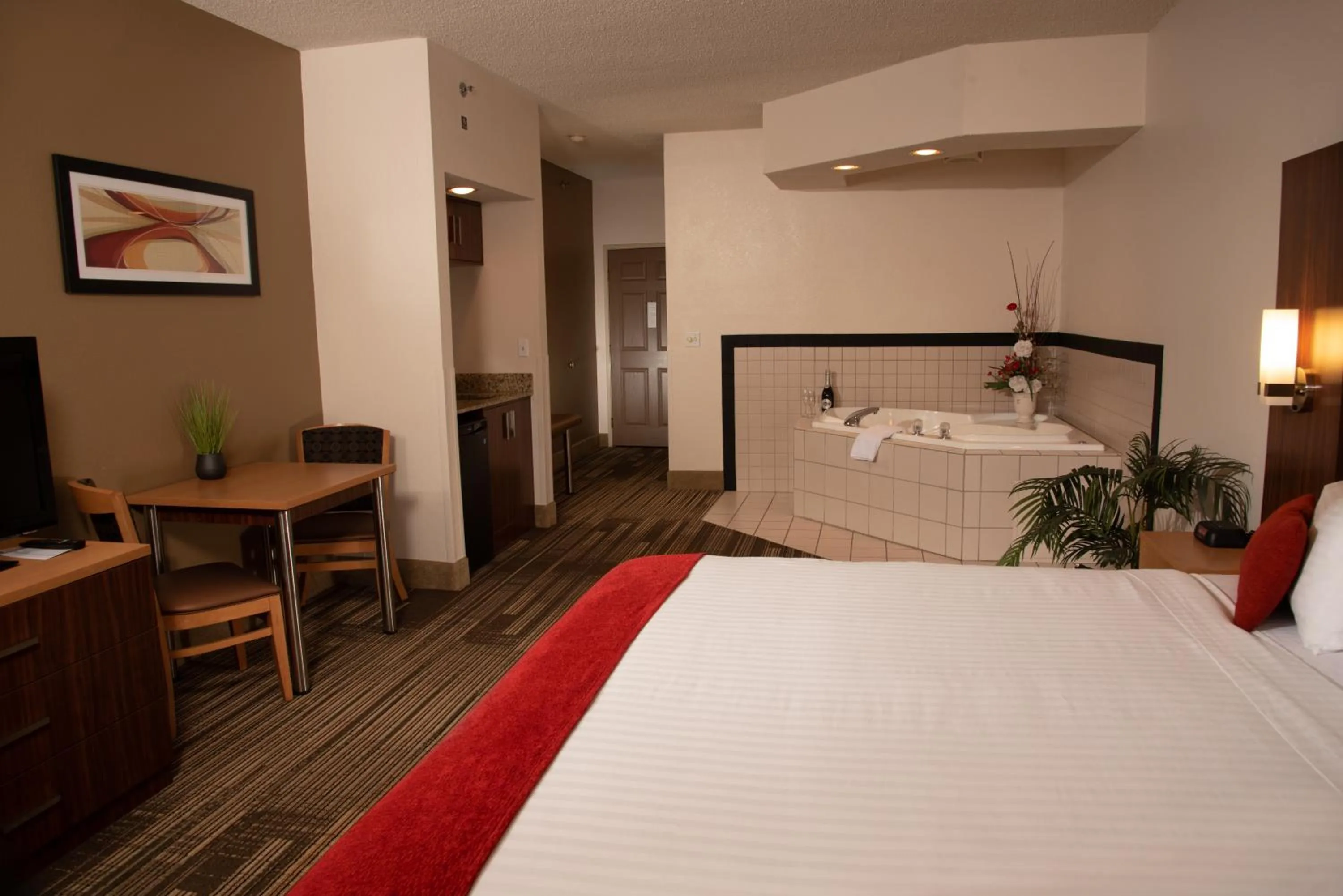 Bed in Northfield Inn Suites and Conference Center