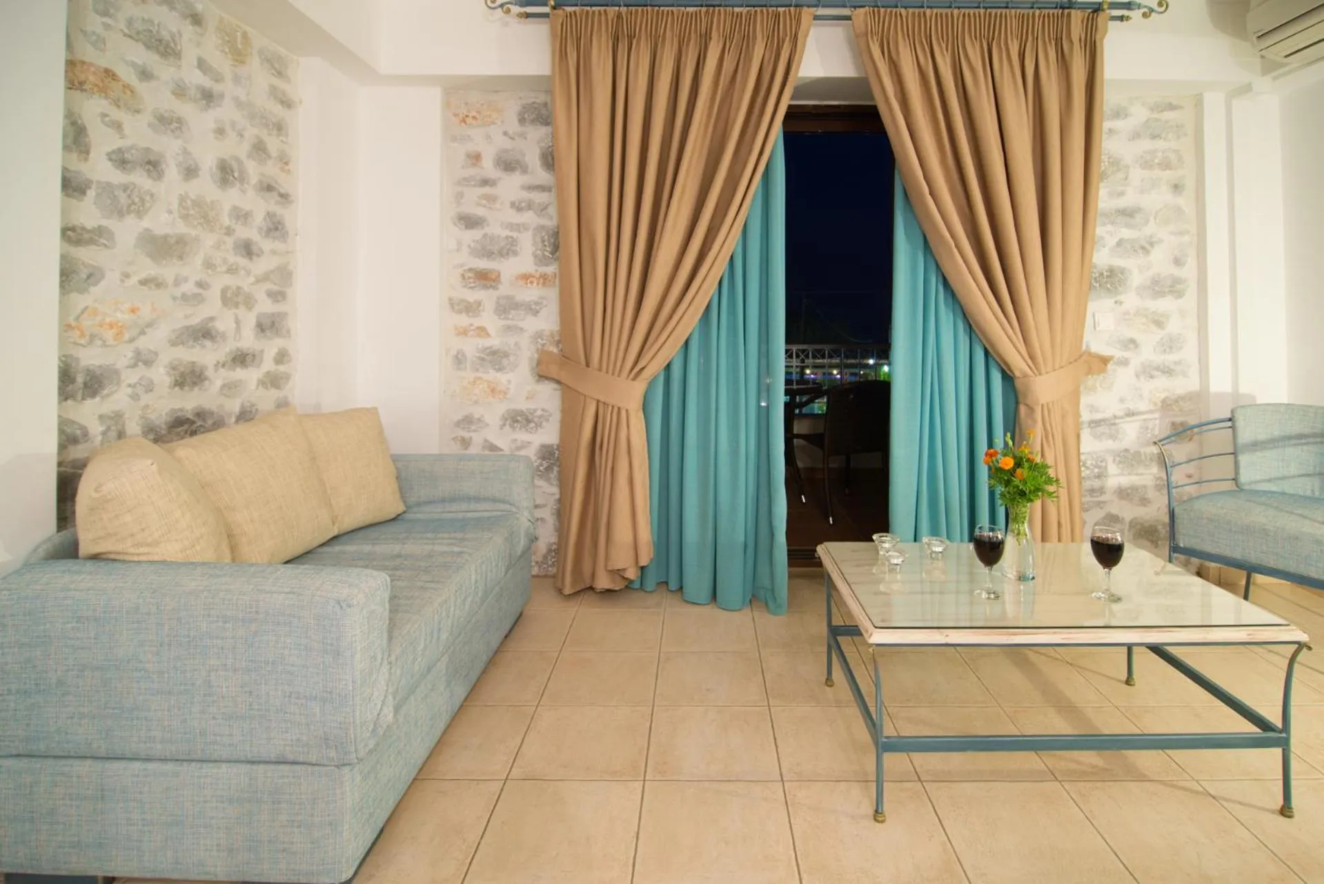 Seating area in Vathi Hotel Apartment Hotel