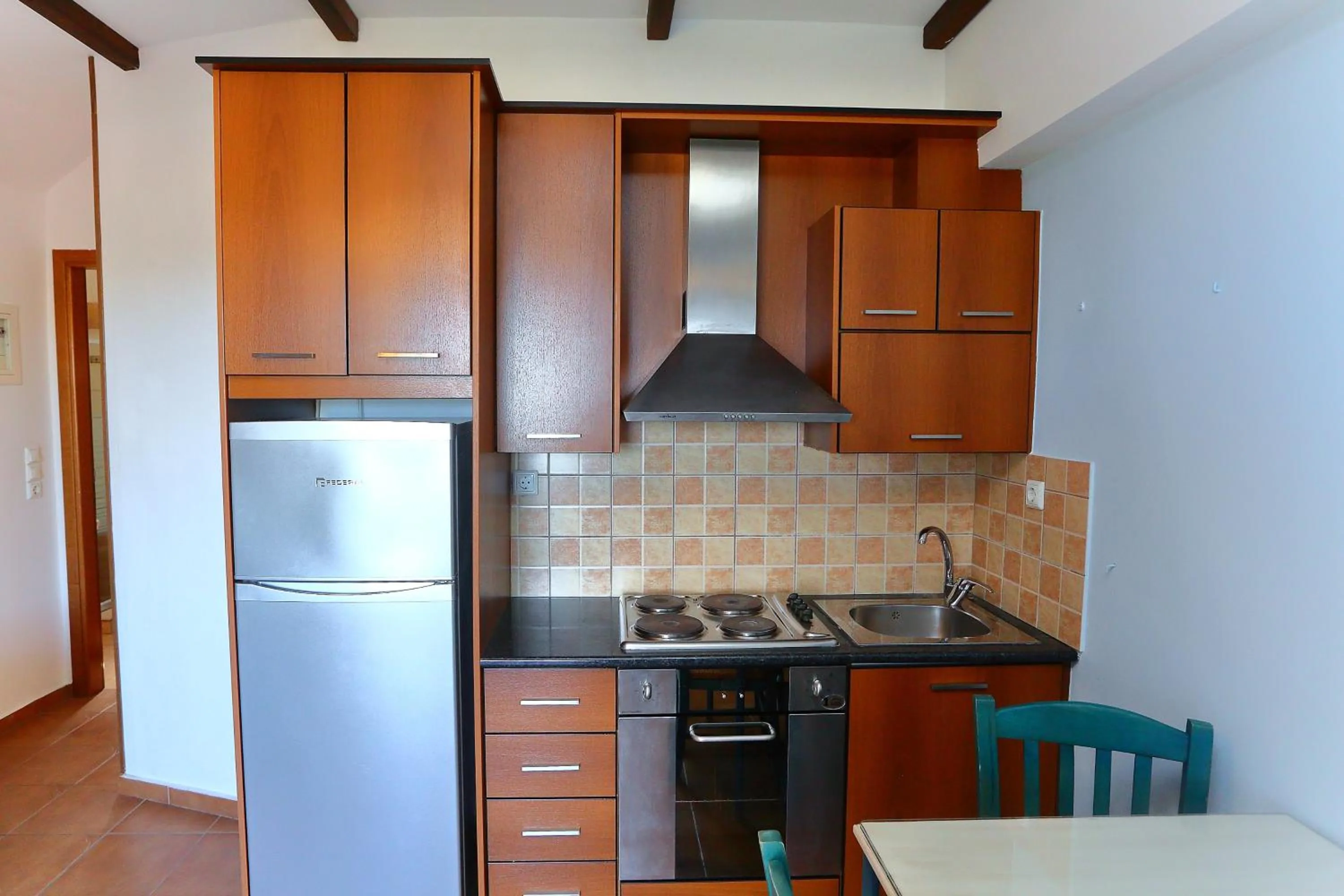 Kitchen or kitchenette in Vathi Hotel Apartment Hotel