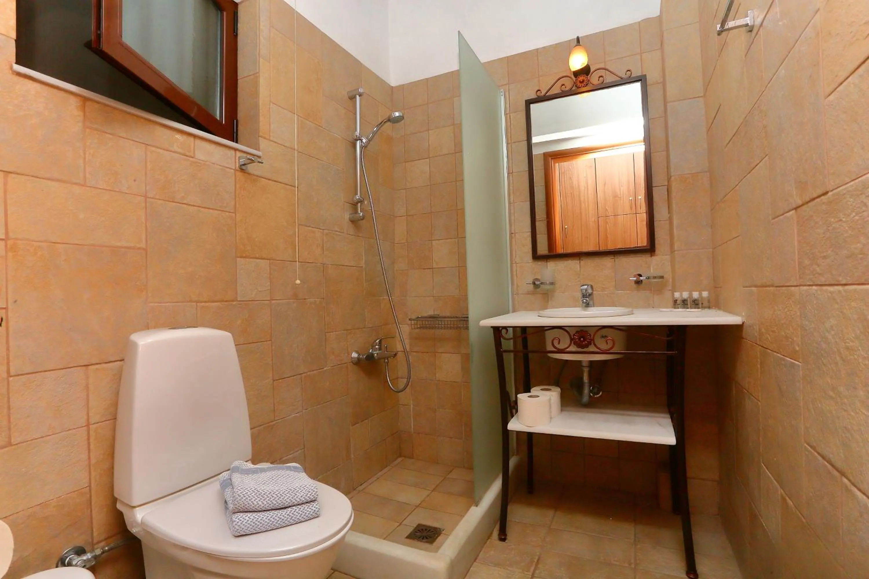 Bathroom in Vathi Hotel Apartment Hotel