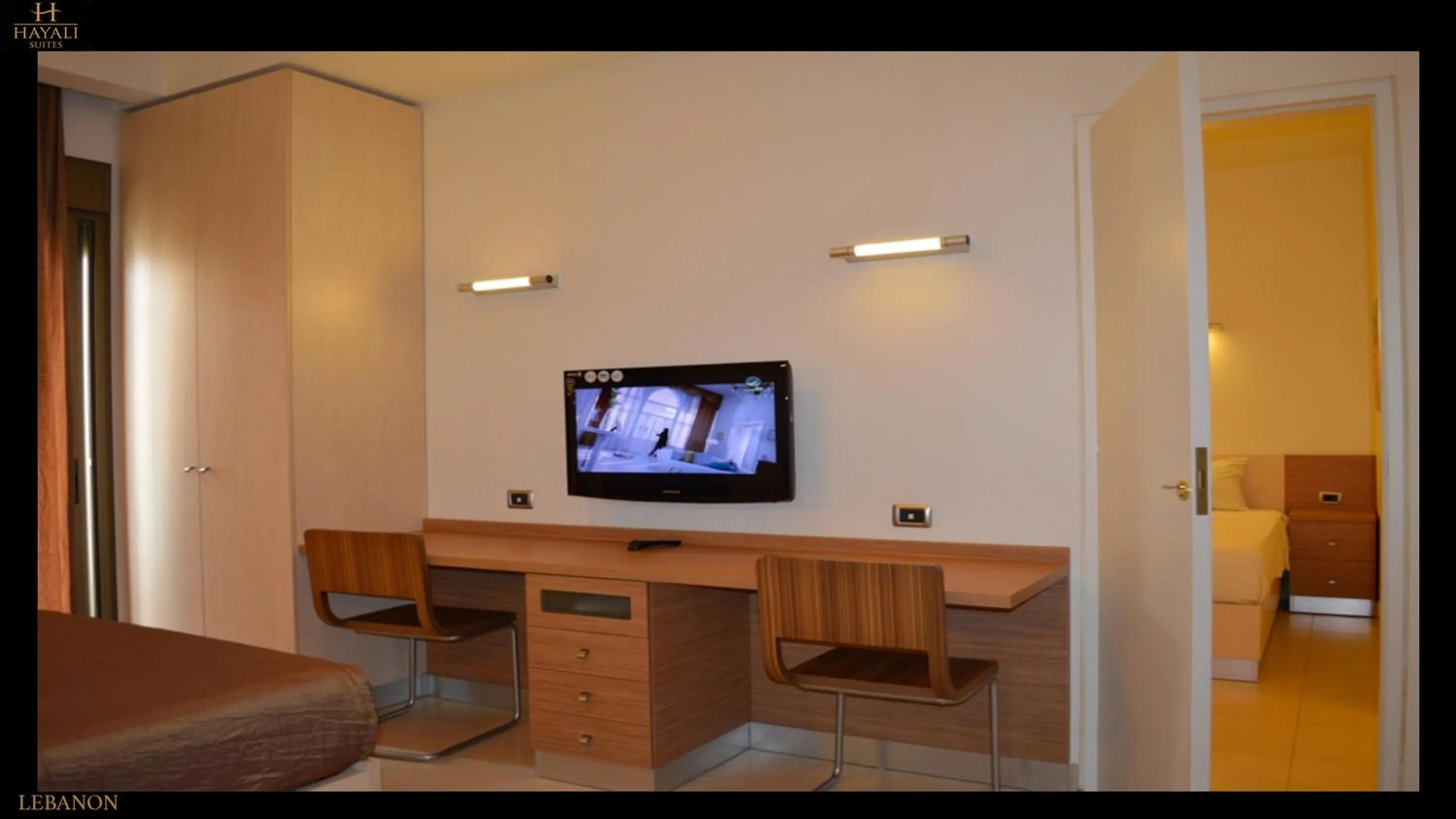 Bedroom in Hayali Suites