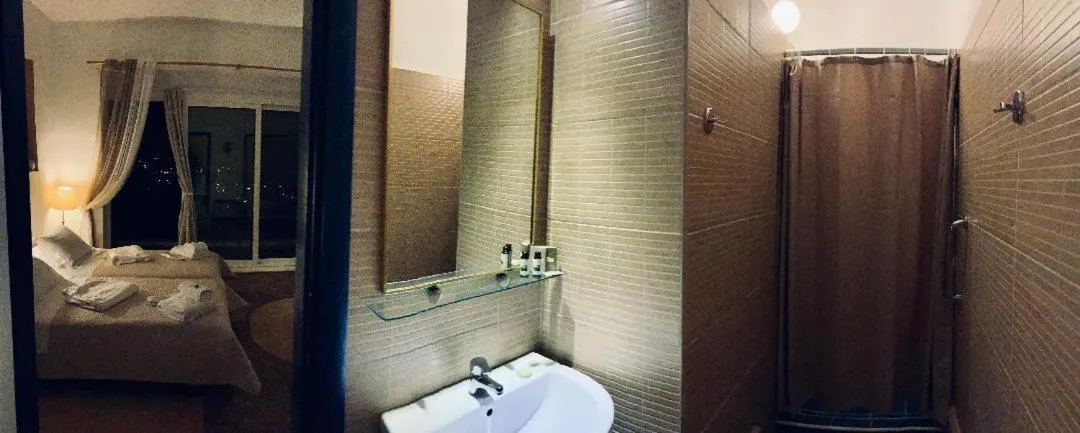 Bathroom in Akrotiri Hotel