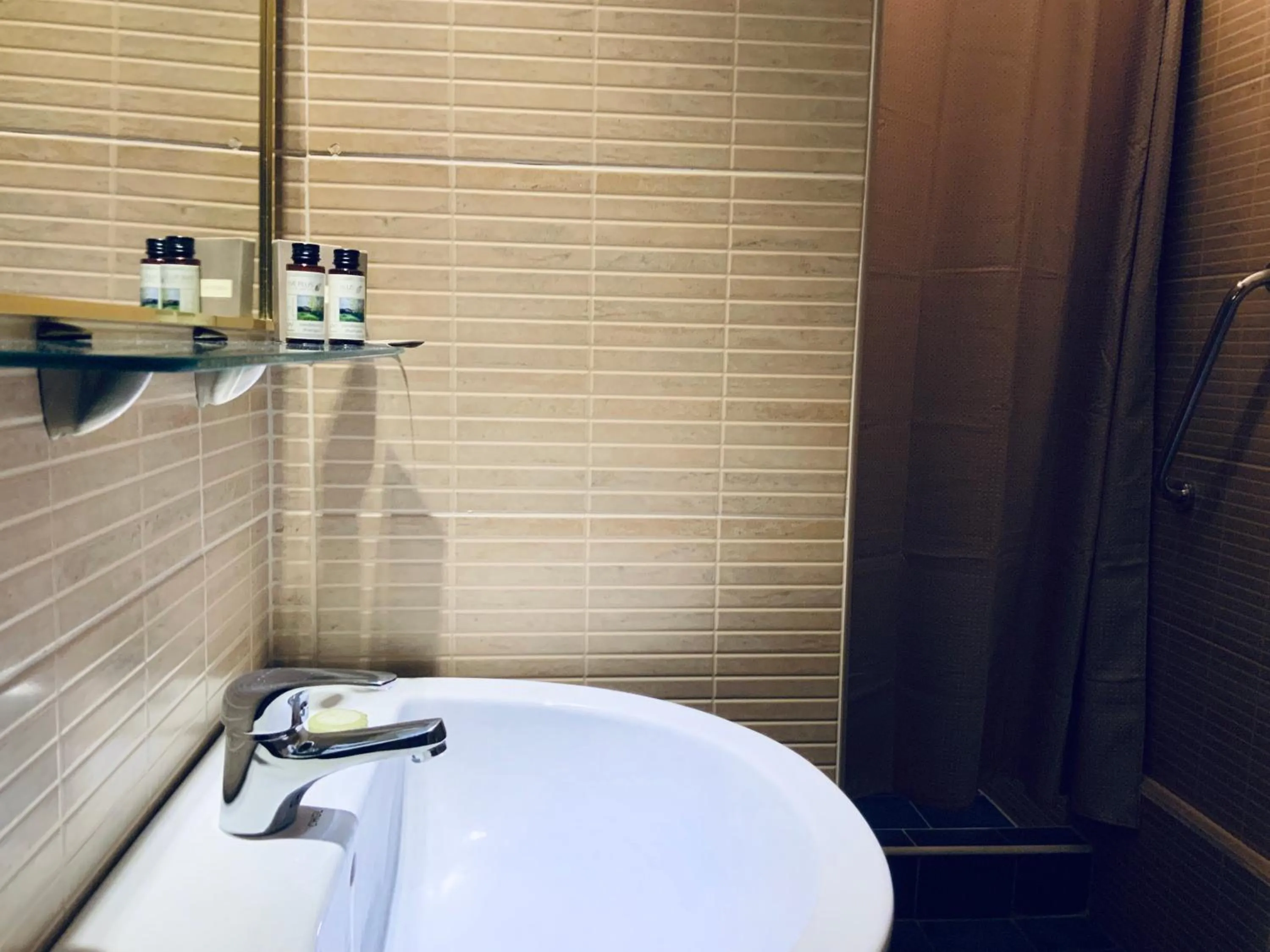 Bathroom in Akrotiri Hotel