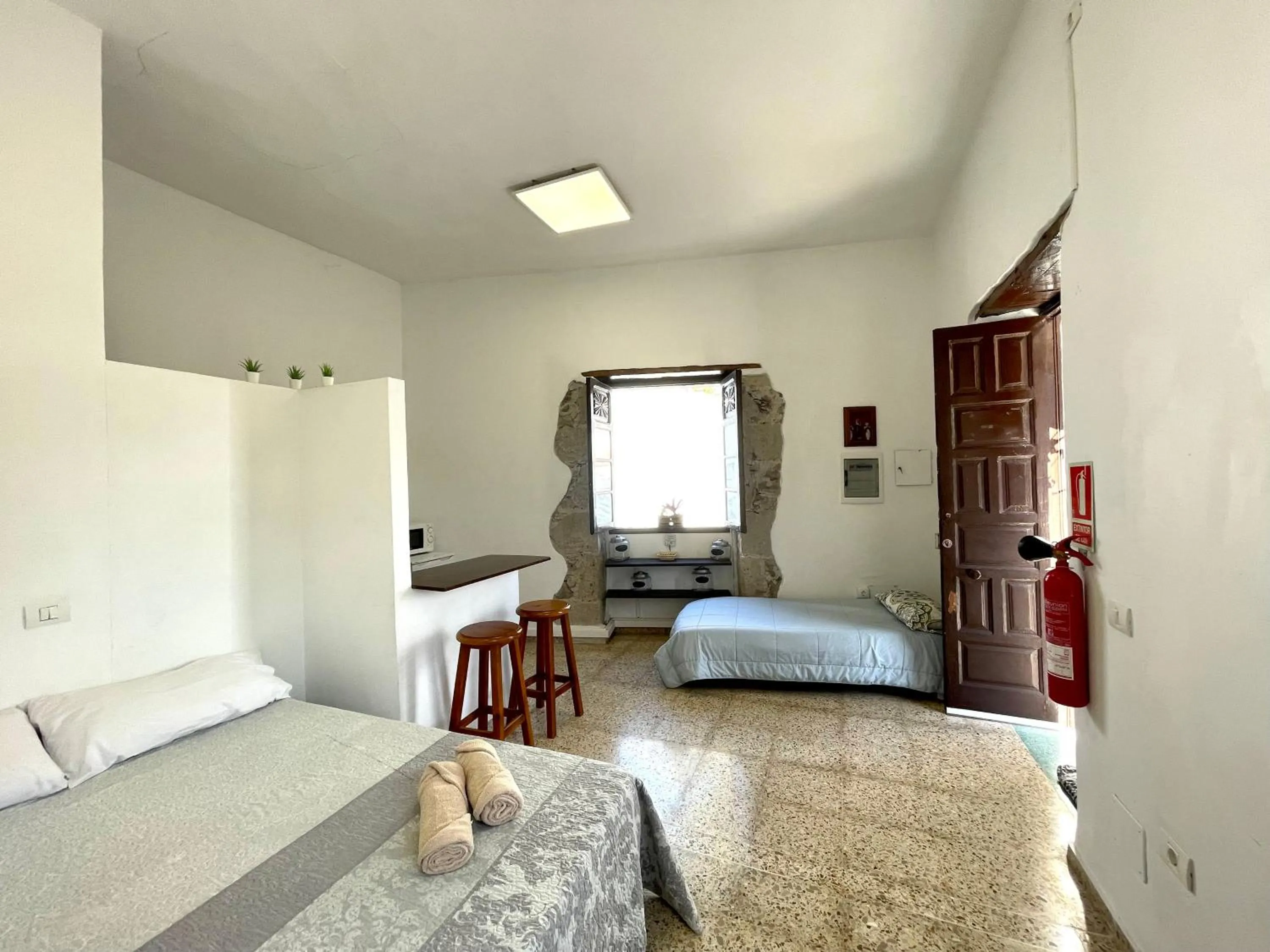 Bed in El Hostal del Cubo