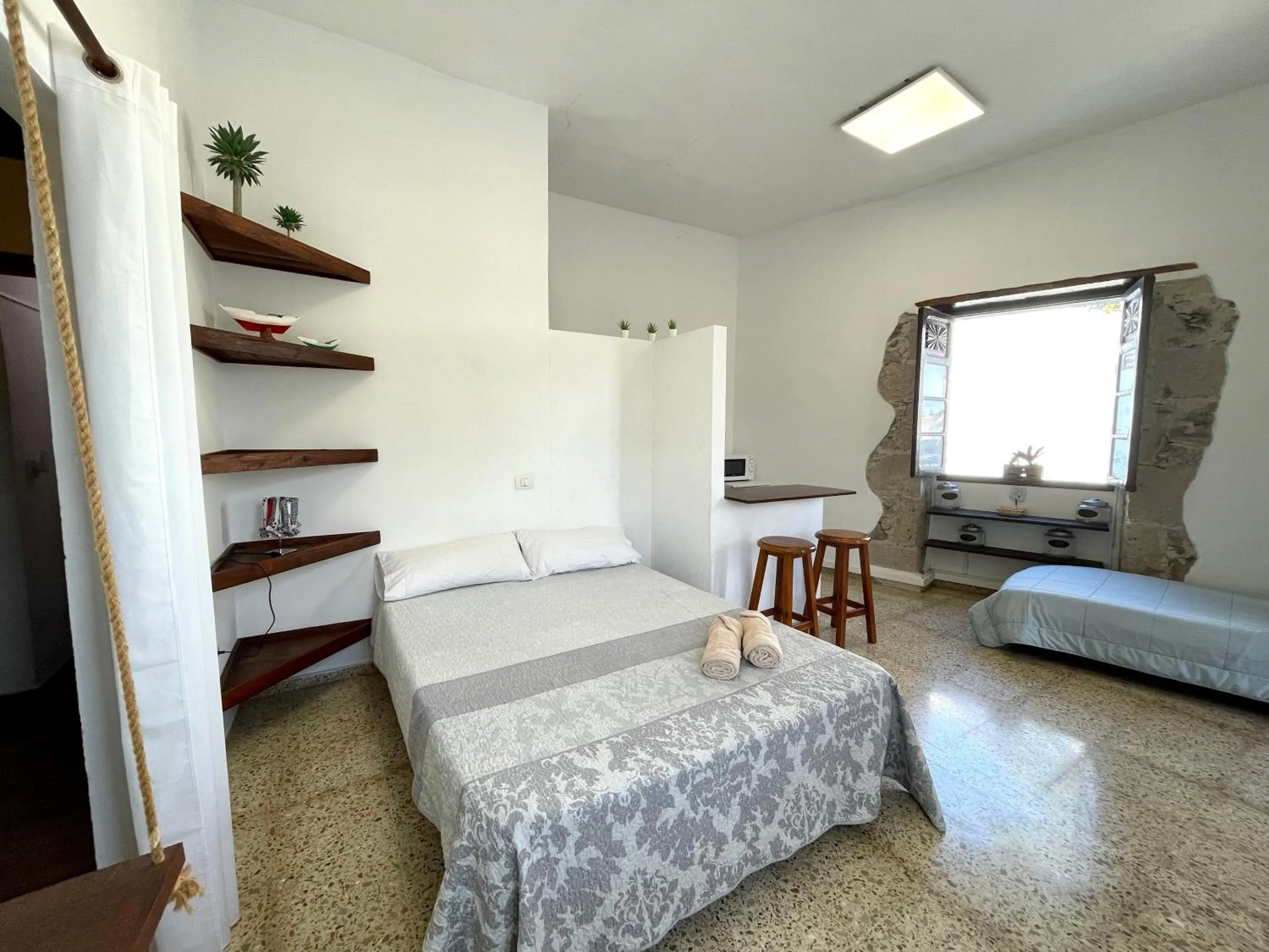 Bed in El Hostal del Cubo