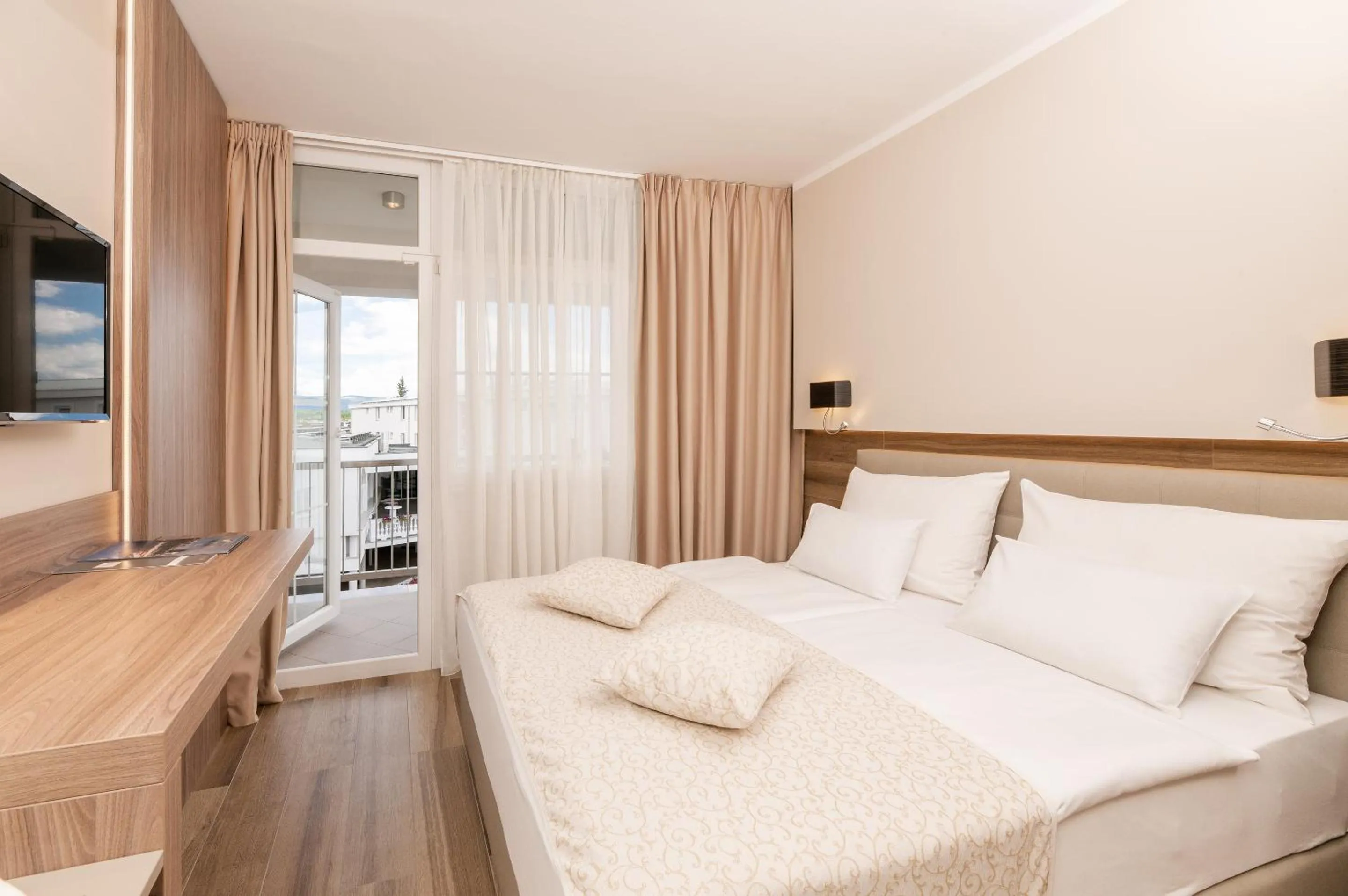 TV and multimedia, Bed in Hotel Malin