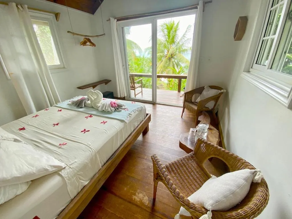 Balcony/Terrace, Bed in Bird Island Bungalows