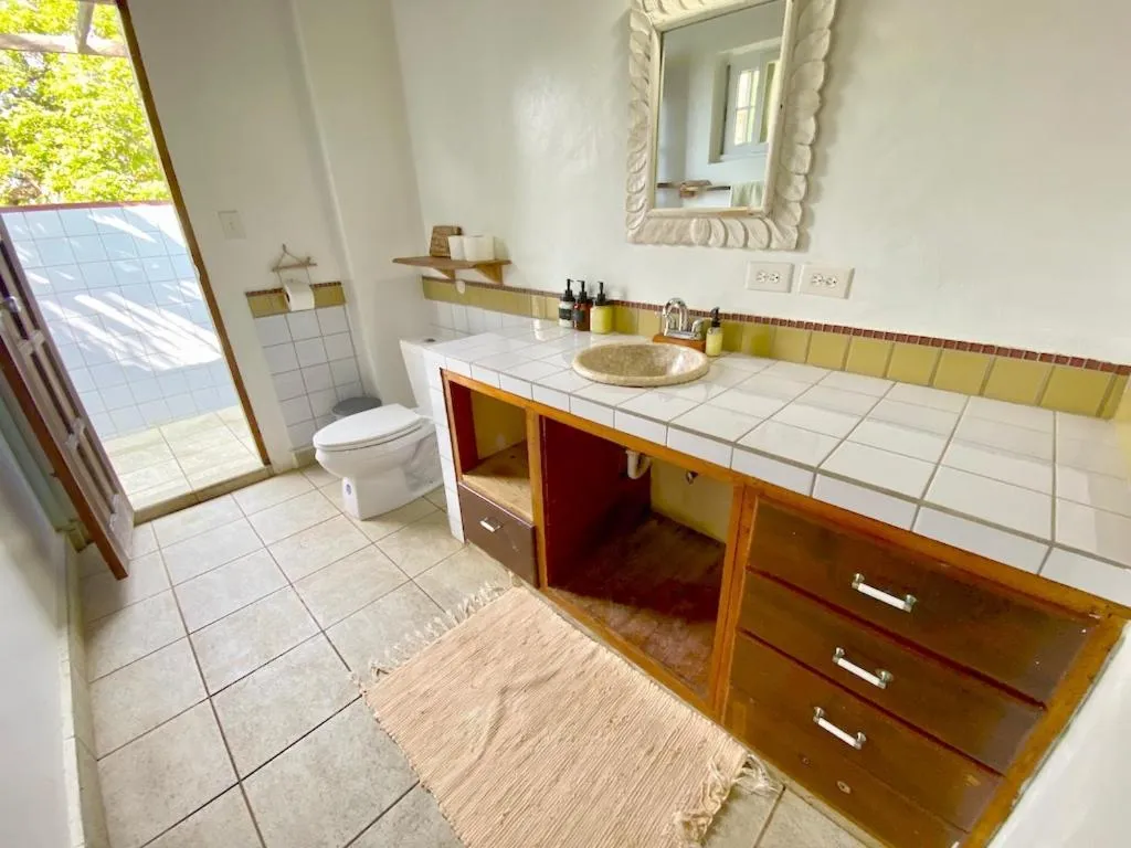 Toilet in Bird Island Bungalows