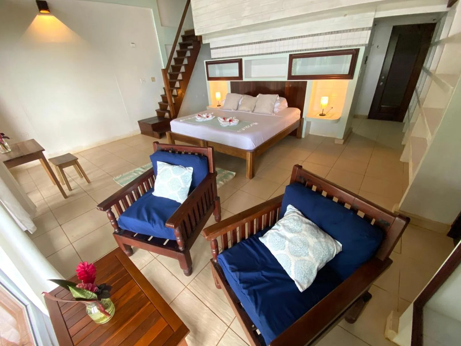 Bed in Bird Island Bungalows