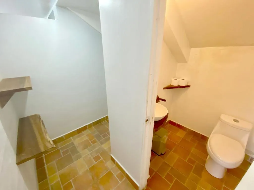 Toilet in Bird Island Bungalows