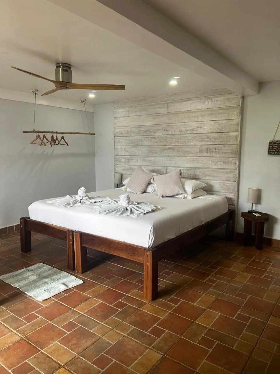 Bed in Bird Island Bungalows