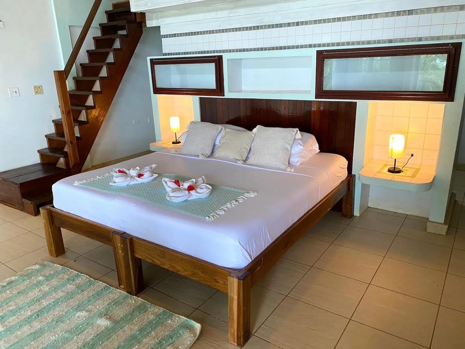 Bed in Bird Island Bungalows