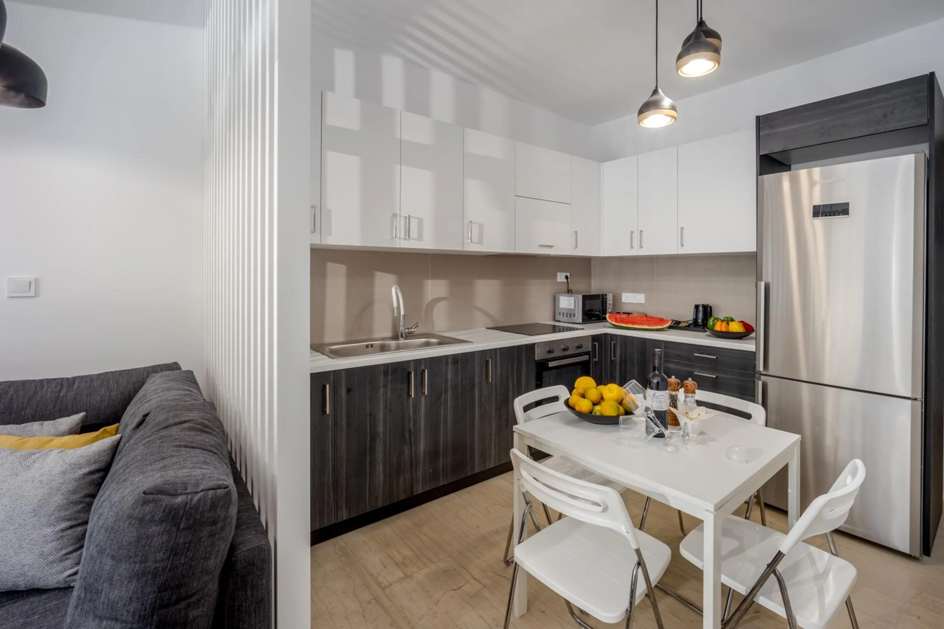 Kitchen or kitchenette in Camelot Royal Beds by Estia