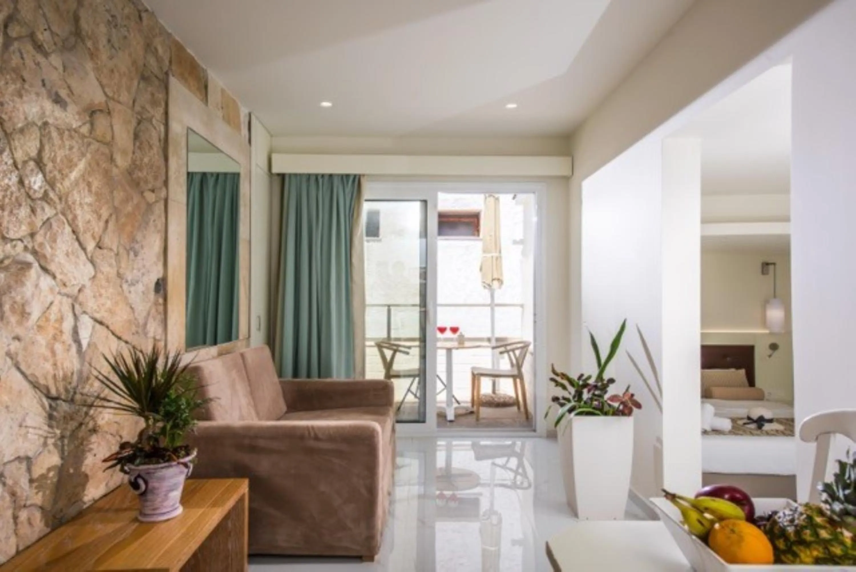 Seating area in Camelot Royal Beds by Estia