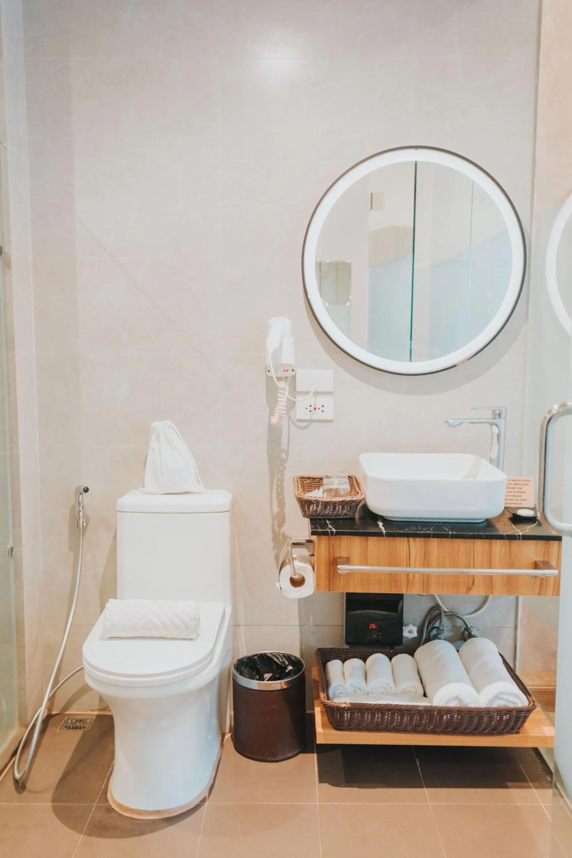 Bathroom in SureStay Plus Hotel by Best Western AC LUXE Angeles City