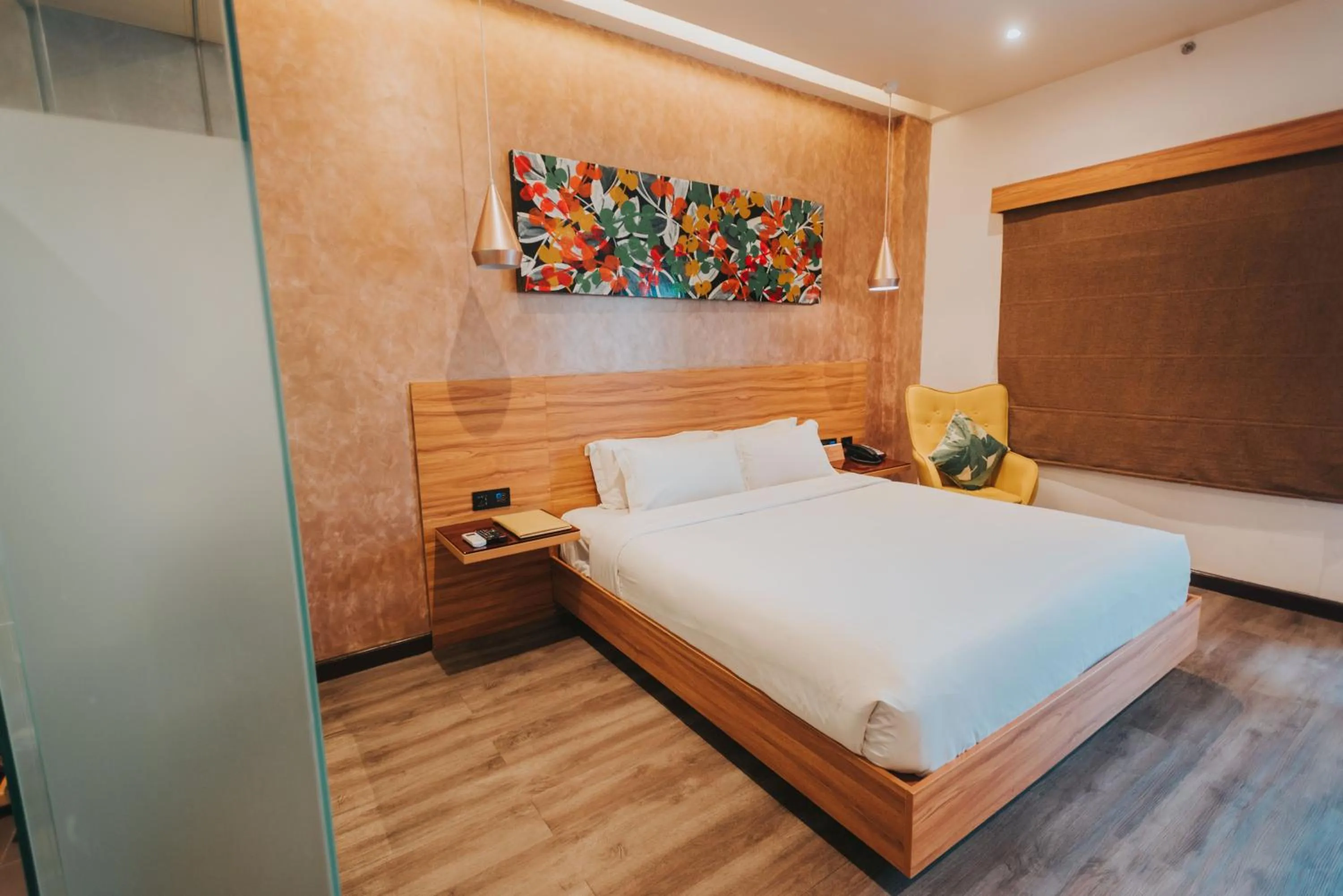 Bed in SureStay Plus Hotel by Best Western AC LUXE Angeles City