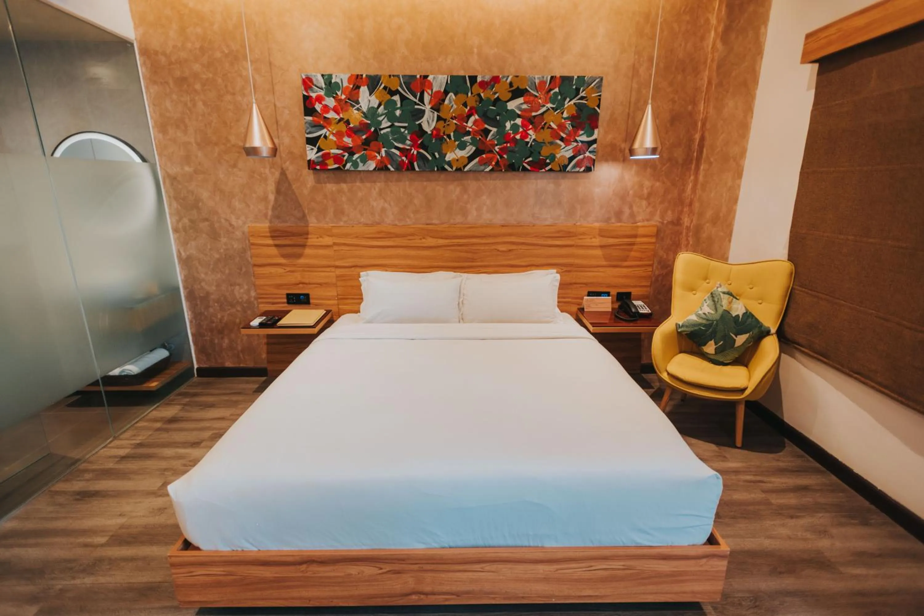 Bed in SureStay Plus Hotel by Best Western AC LUXE Angeles City